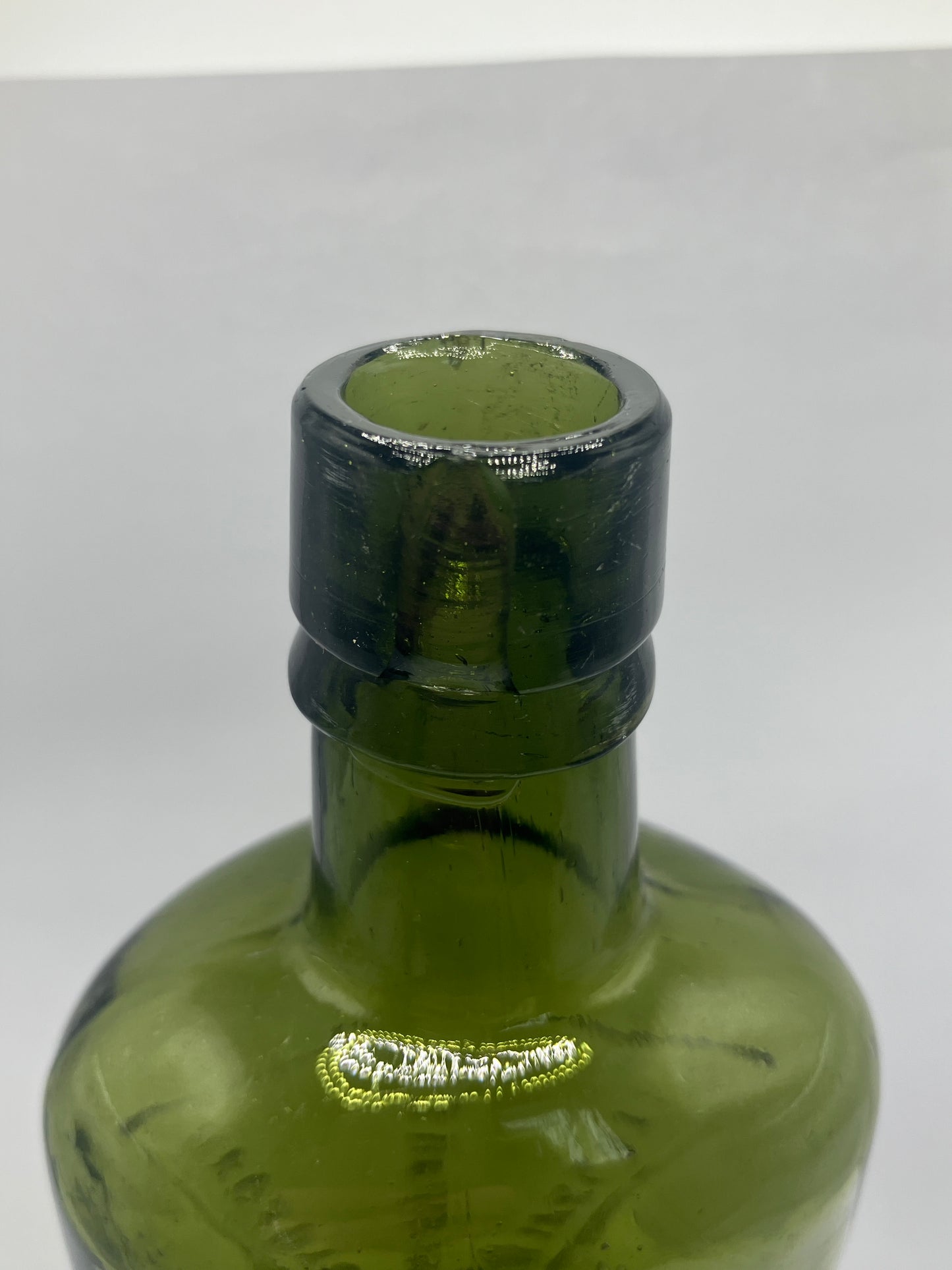 Dark green Bradford chemist bottle