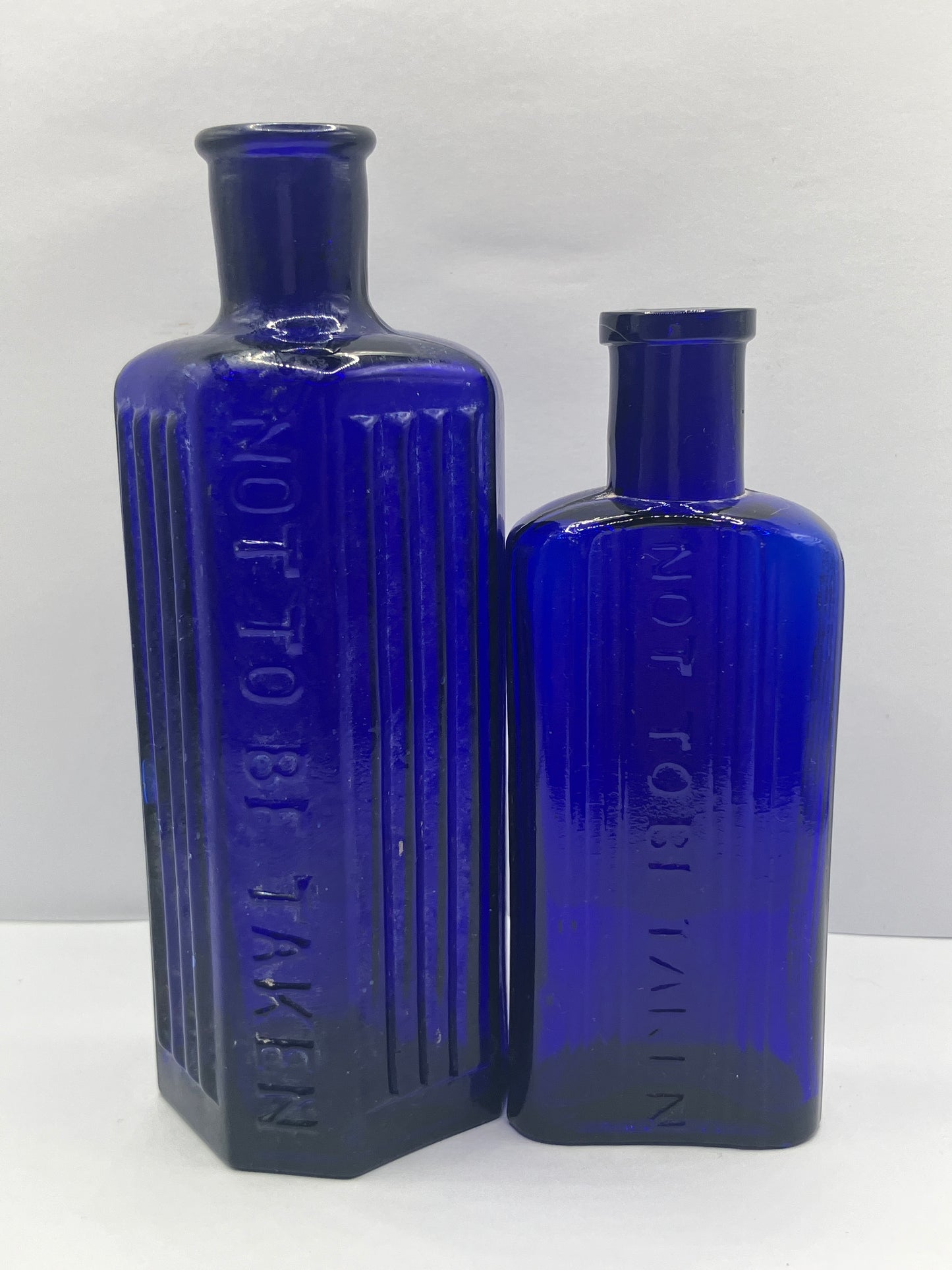 2 blue ribbed poison bottles, Not to be taken