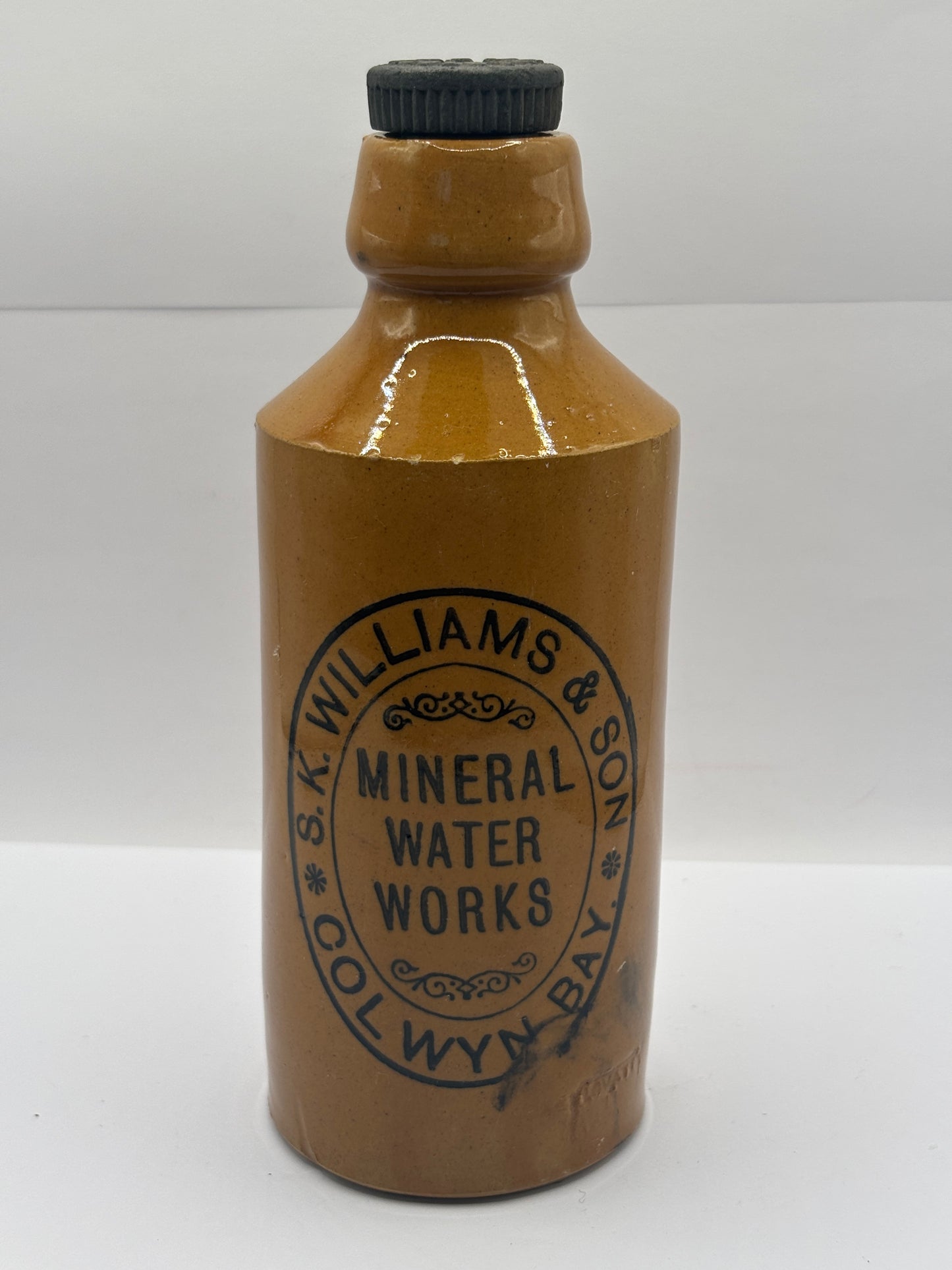 Old stoneware ginger beer bottle, K.Williams & son. Colwyn Bay