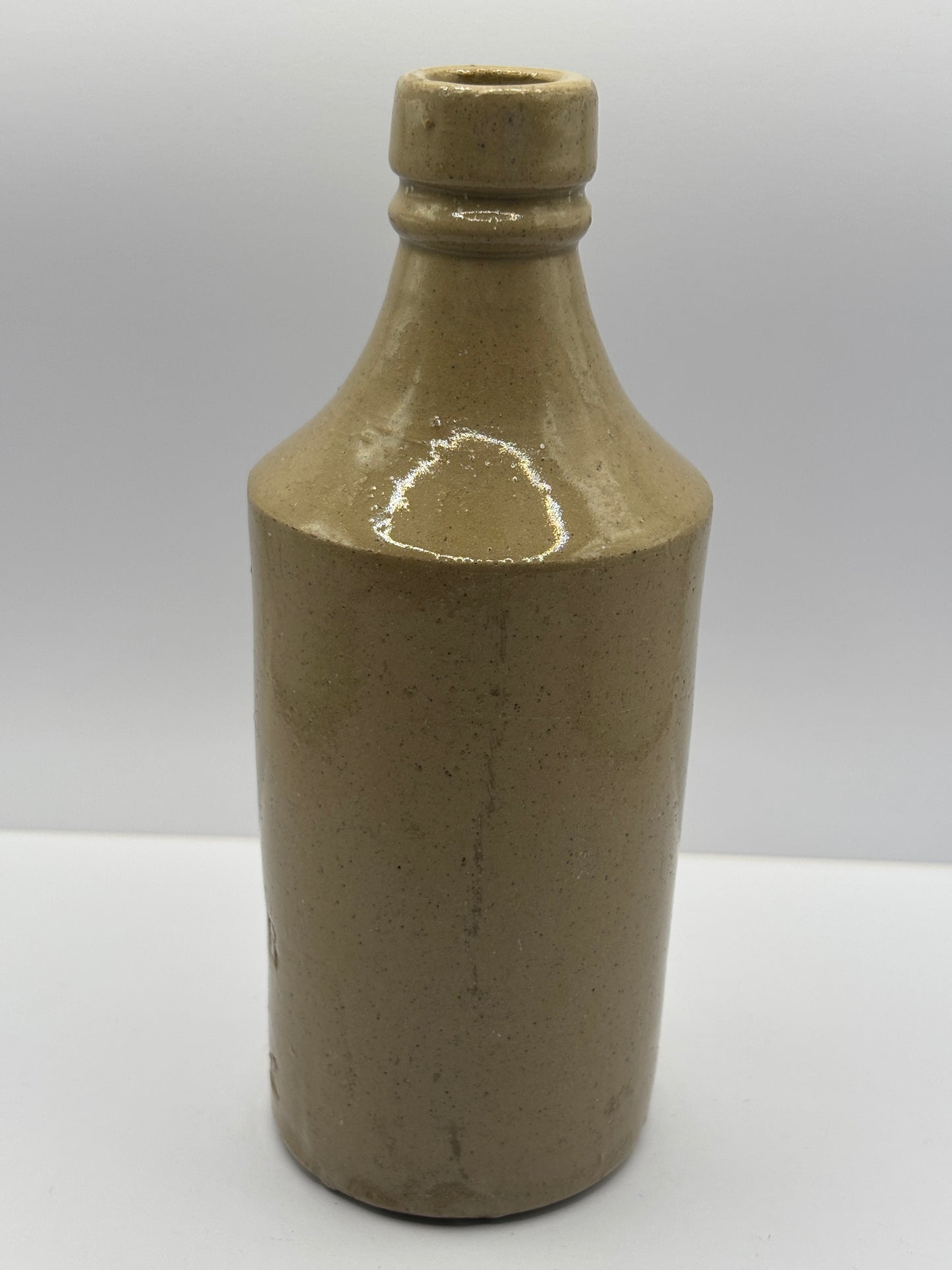 Old White Stoneware Vets Bottle, W.Bower, M.B CVS RUDHAM 17cms