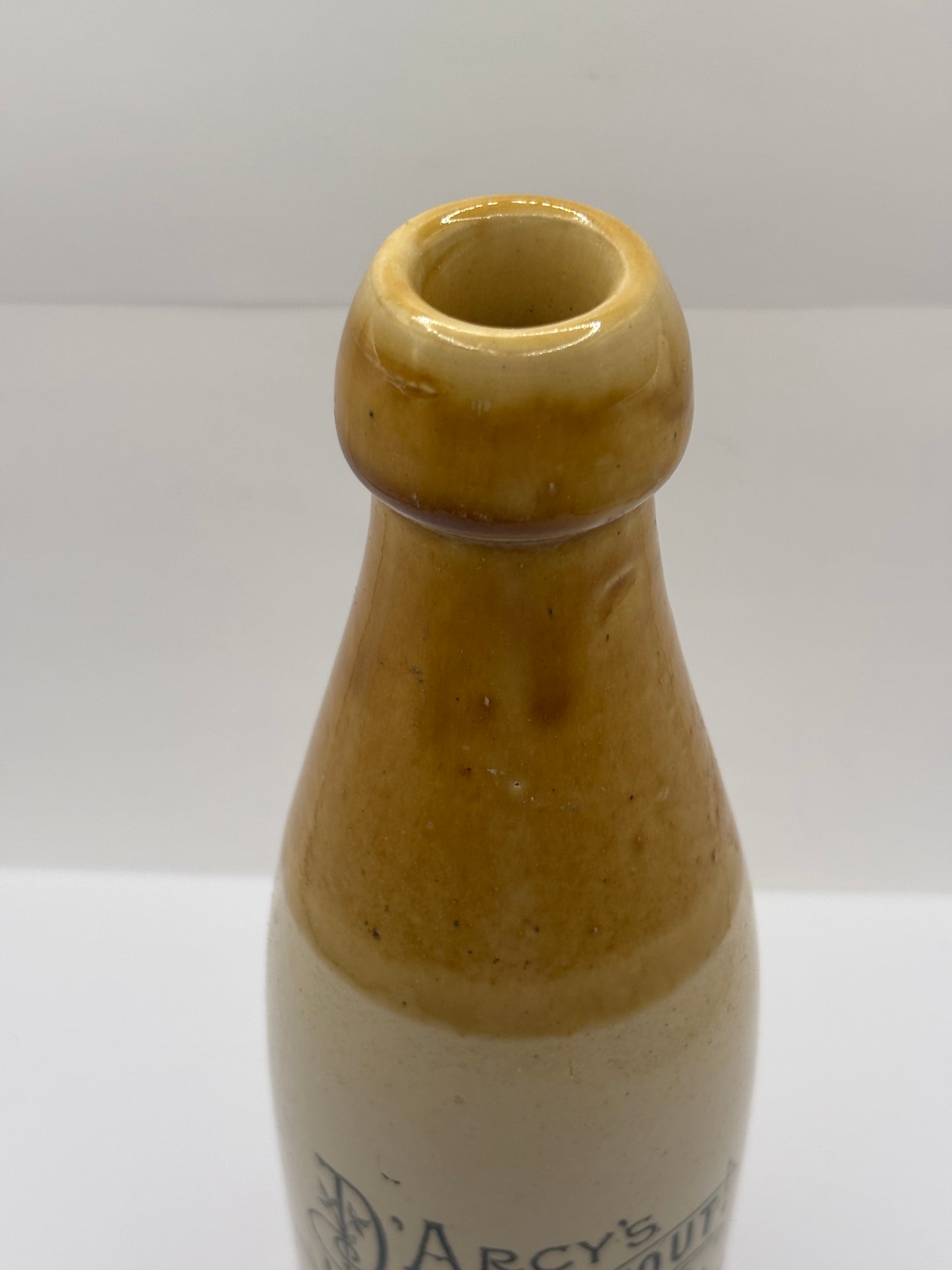 Old stoneware stout bottle, Darcy’s invalid stout, Newcastle on Tyne