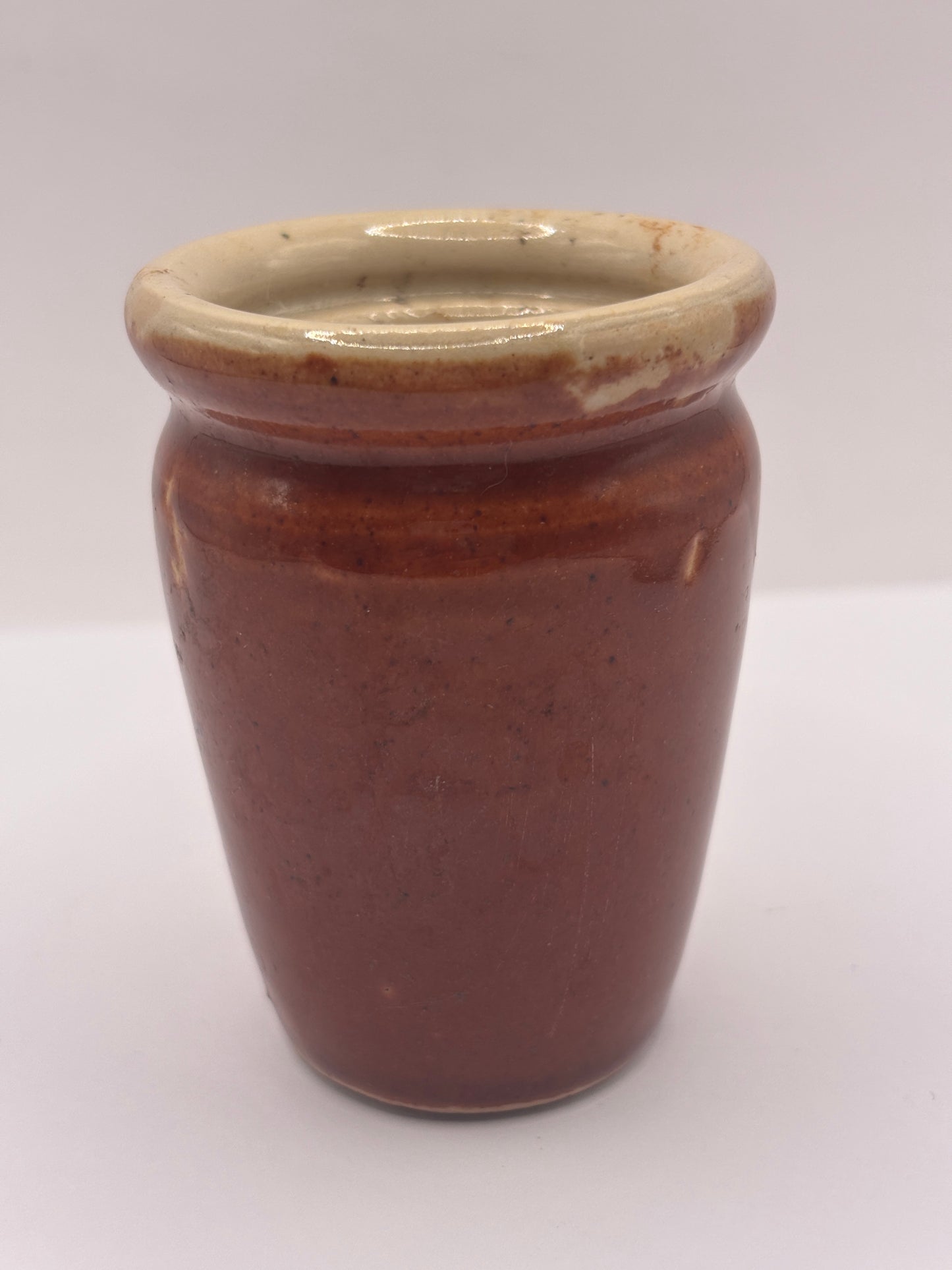 Old small brown stoneware cream pot