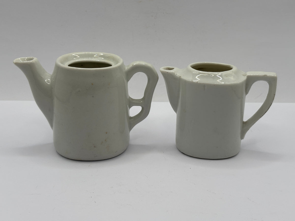 2 old small dolls house tea pots (no lids)