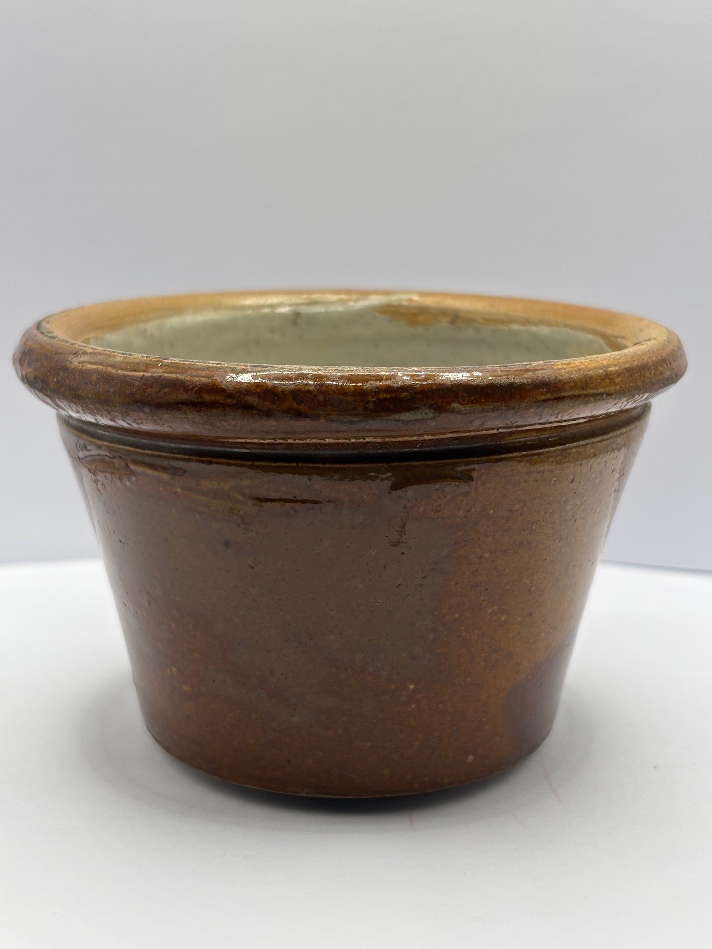 Old small brown stoneware bowl
