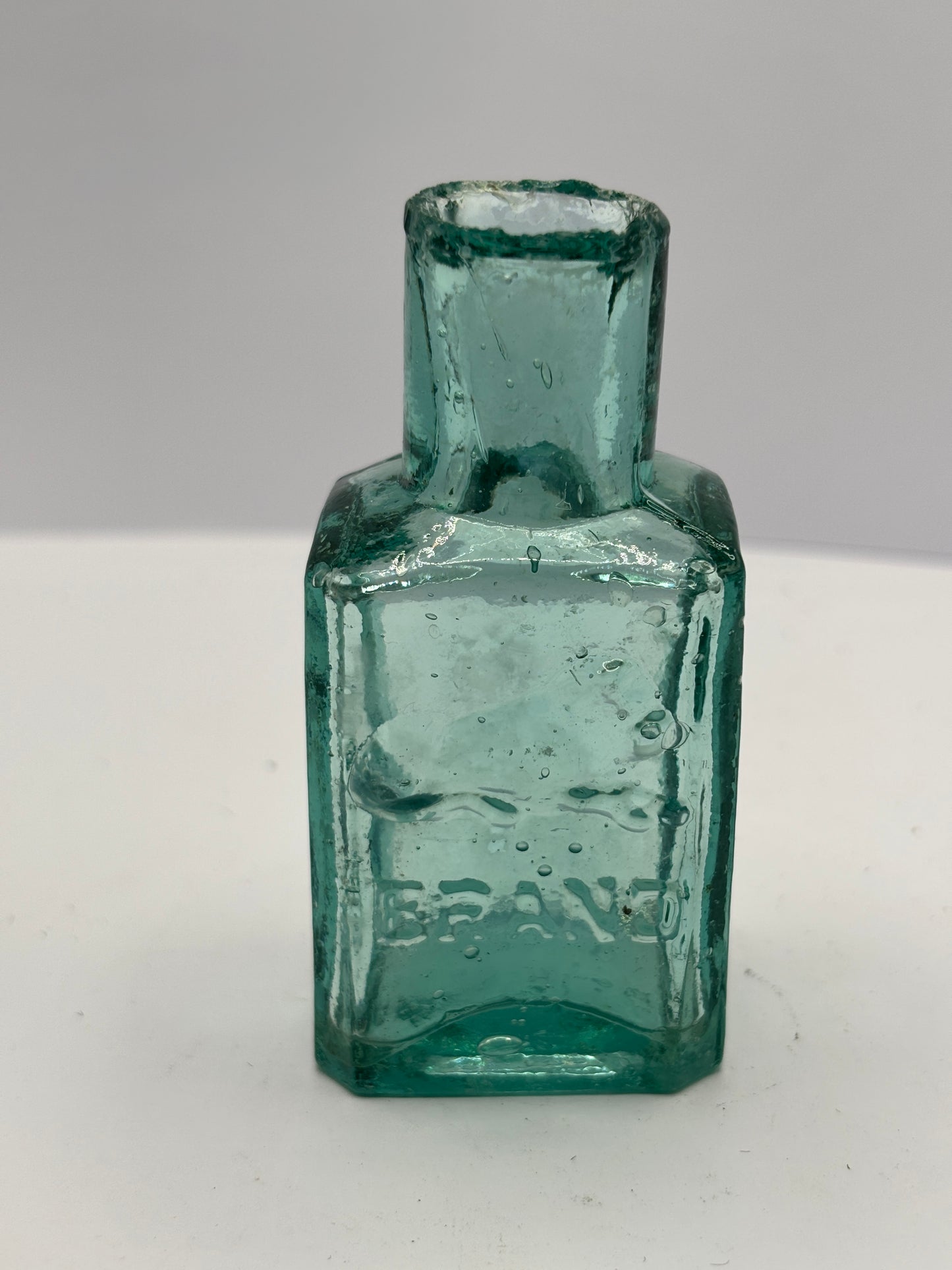 Old aqua glass Lion Brand ink, ink bottle, inkwell