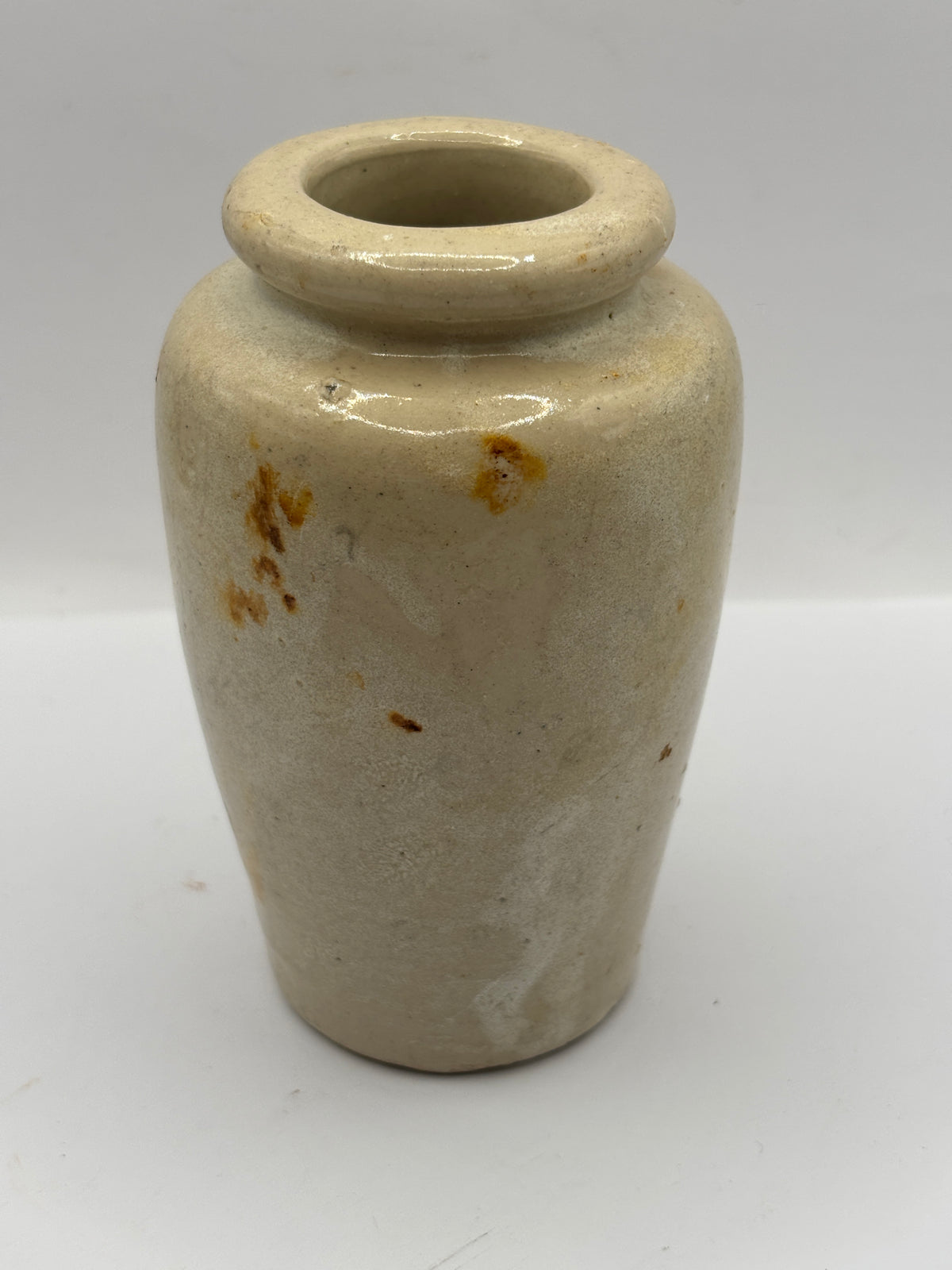 Old stained stoneware cream pot