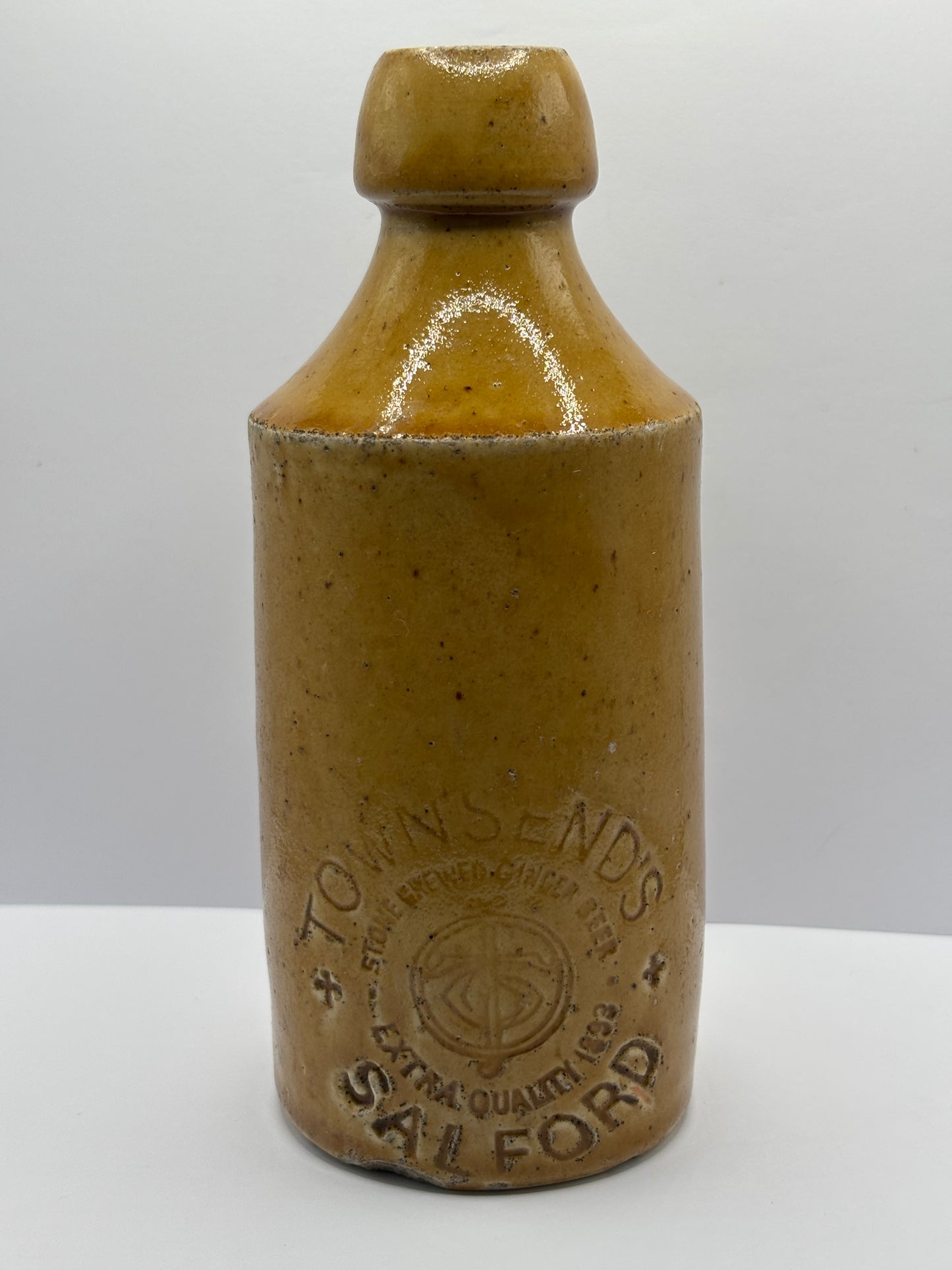 Old impressed stoneware ginger beer bottle, Townsends Salford
