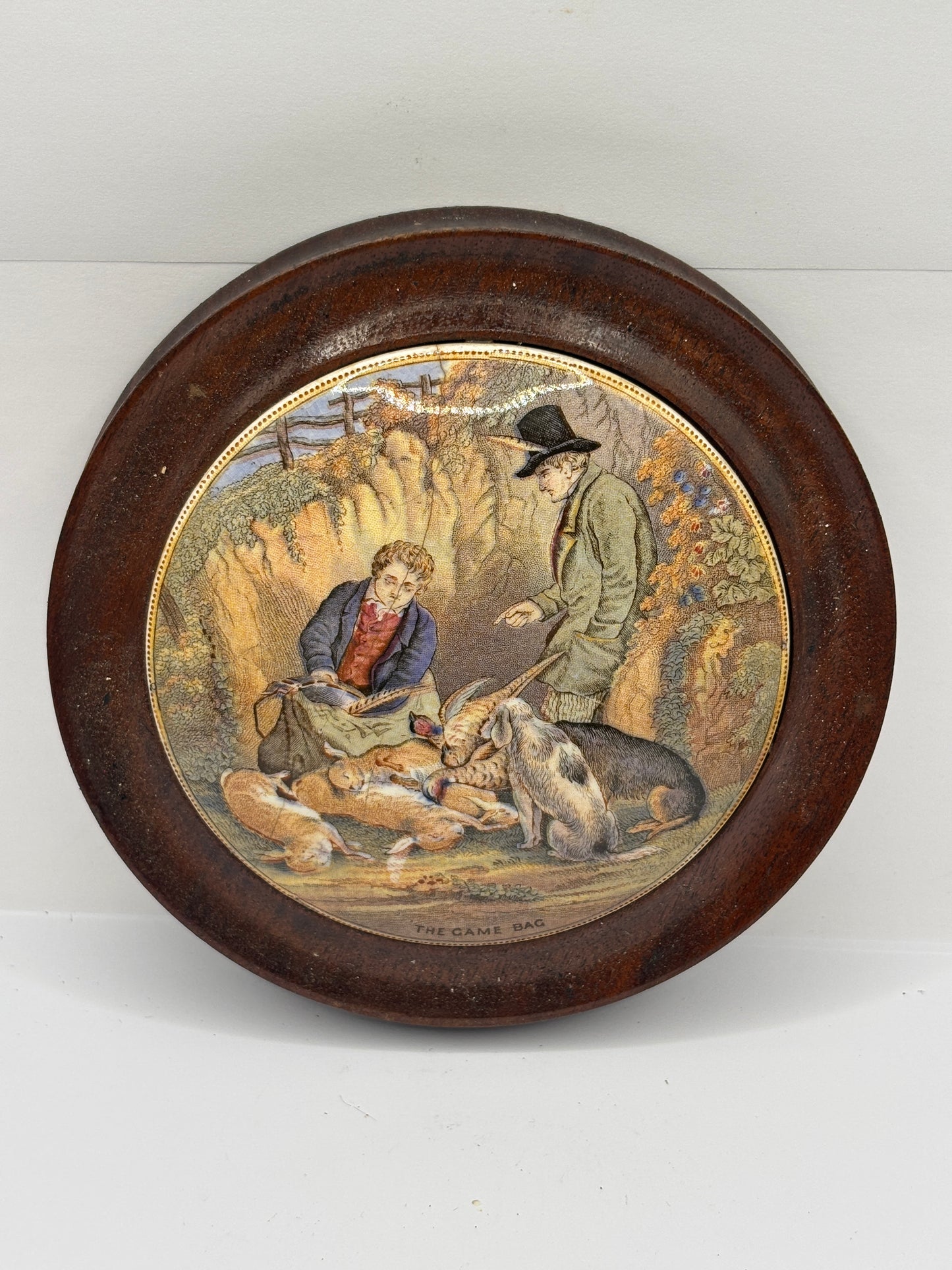 Old Prattware lid, The game bag. In original wooden frame