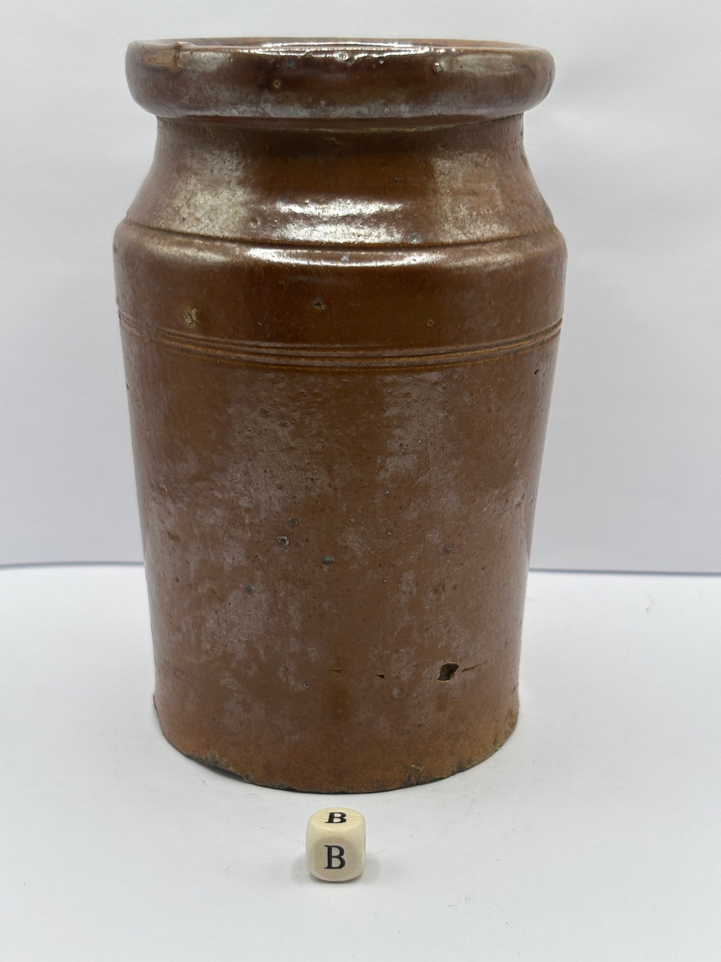 Old brown stoneware jar (B)