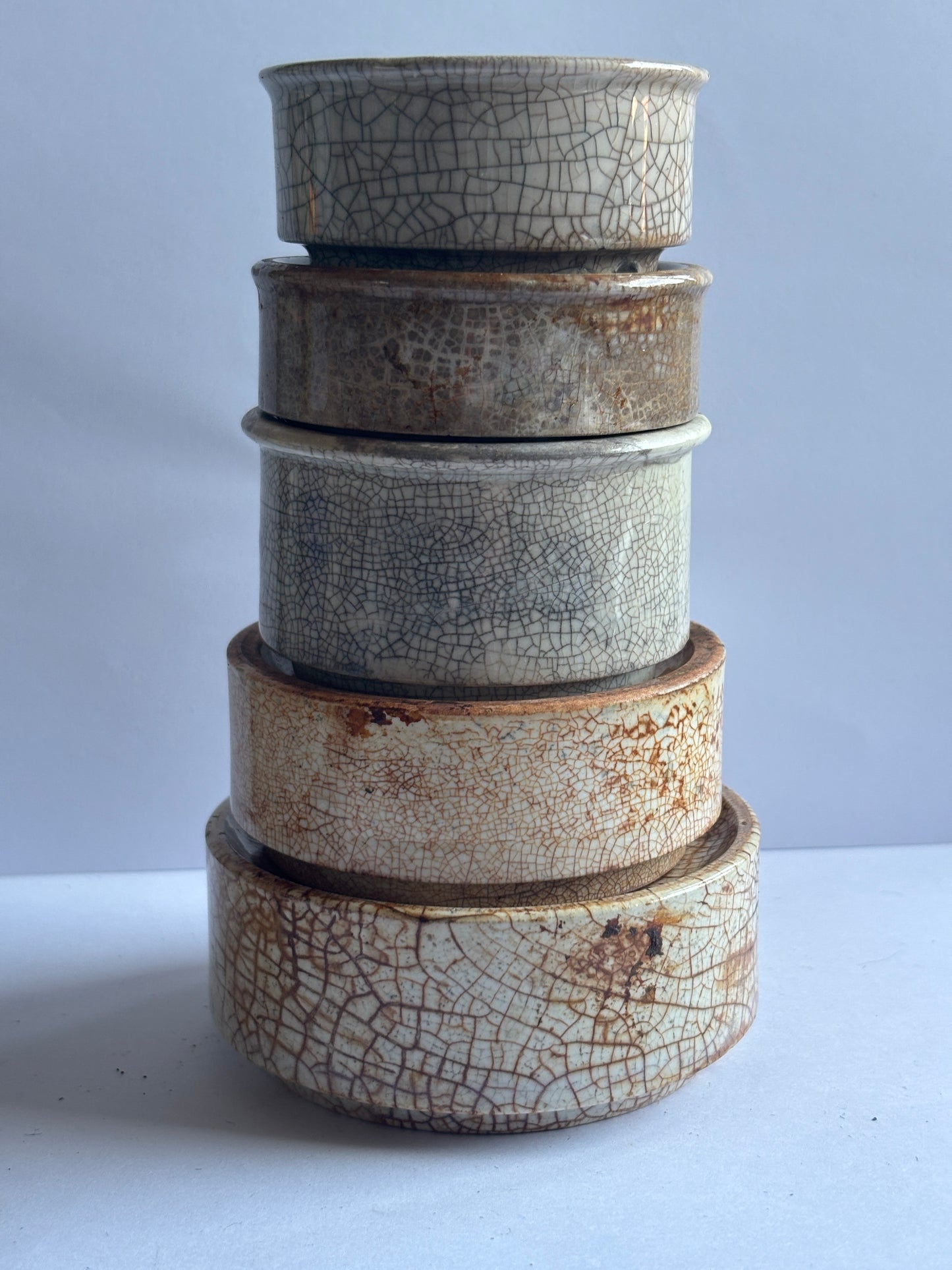 5 old pot lid bases, stackers, risers