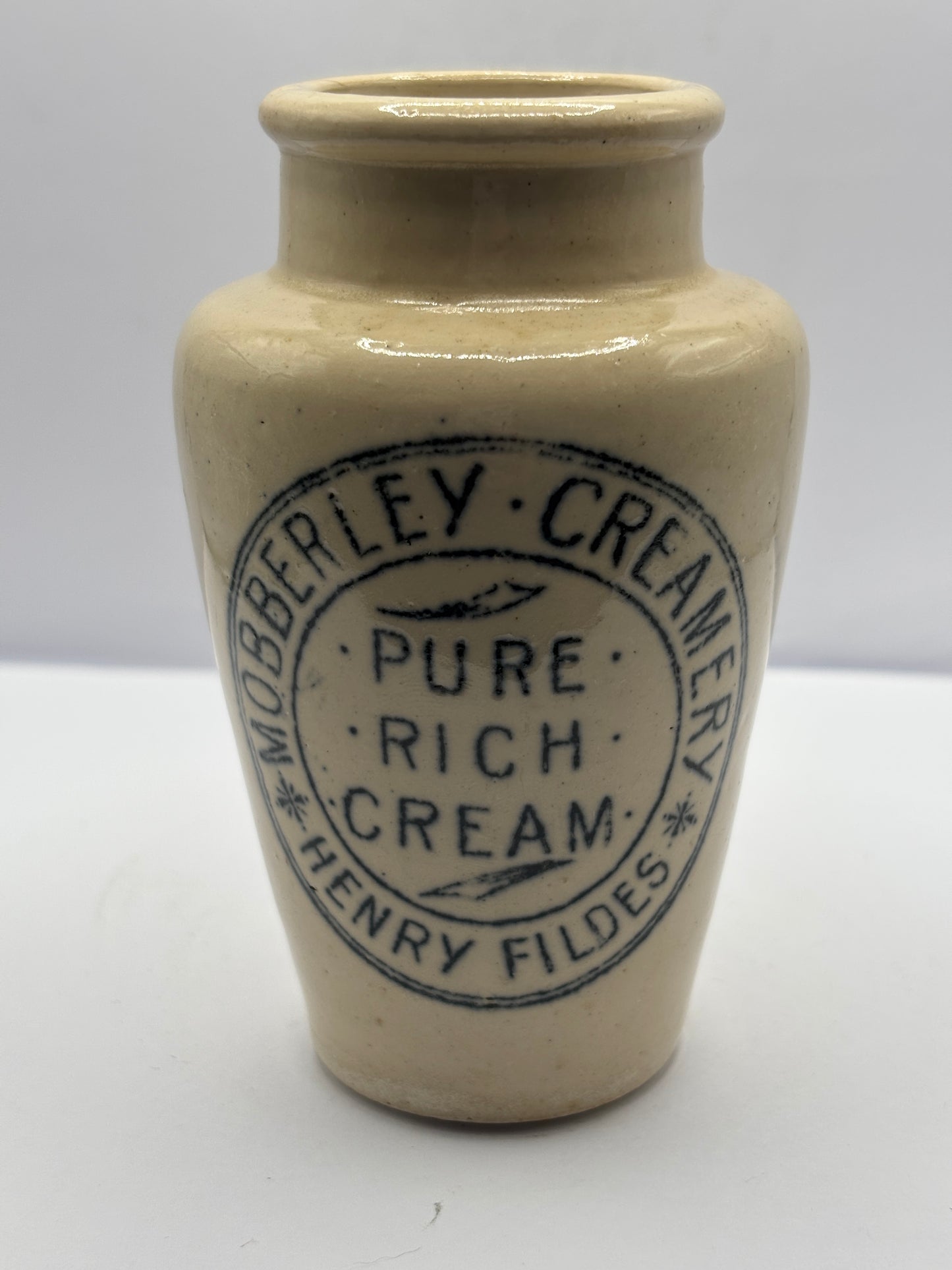 Old advertising stoneware cream pot, Mobberley creamery. Pure rich cream