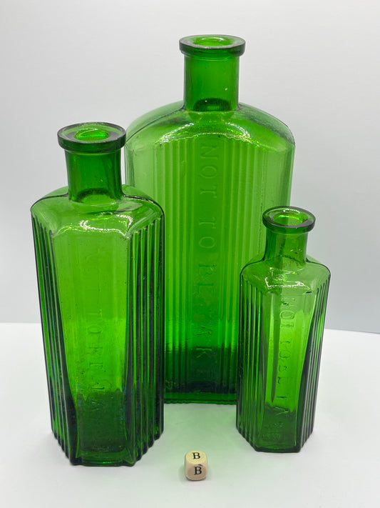 3 old green poison bottles, not to be taken
