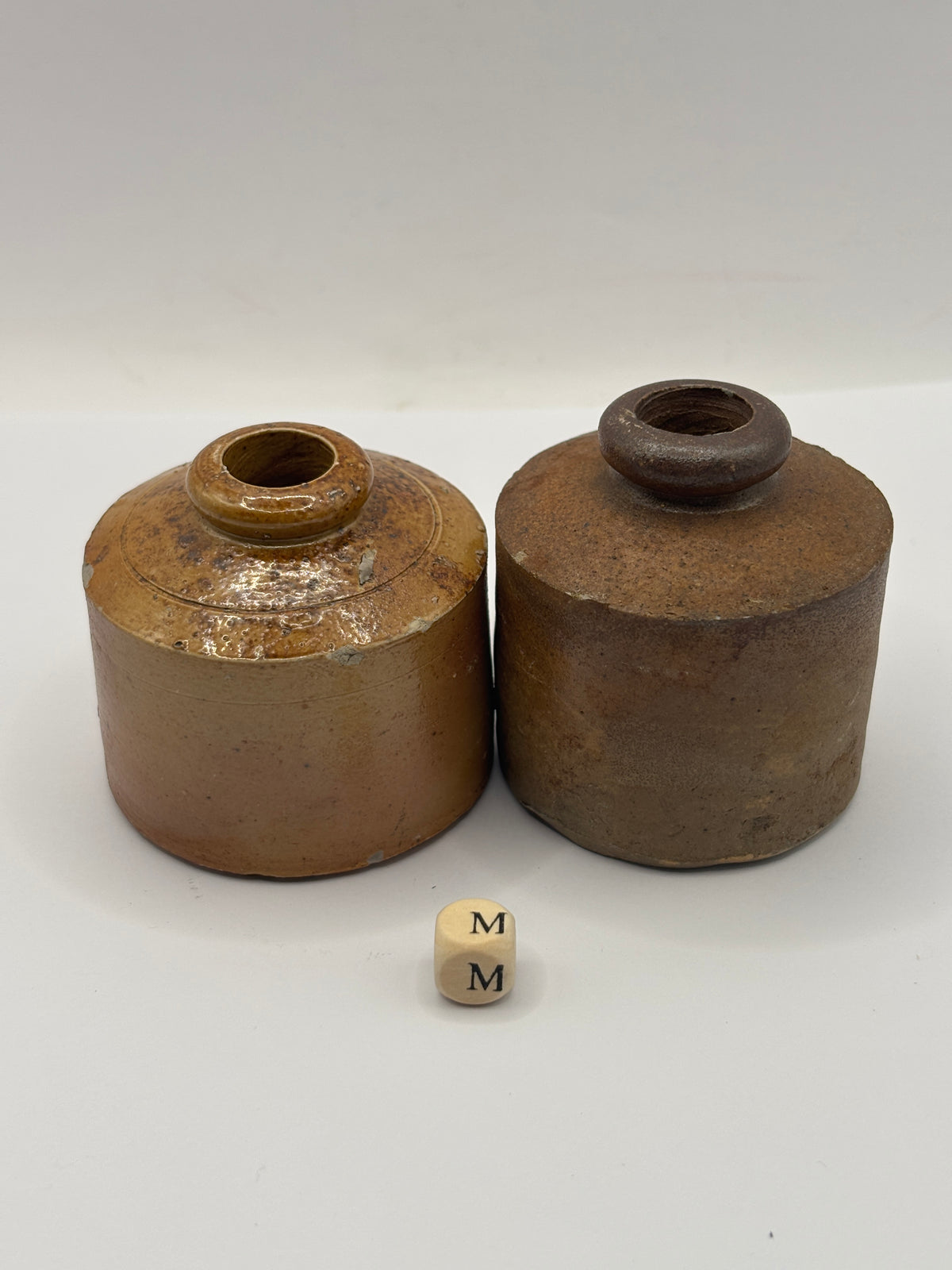 2 old brown stoneware ink bottles, inks. Pork pie ink (m)