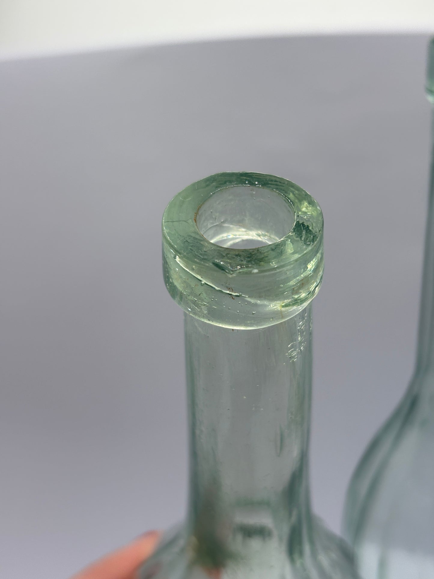 2 old aqua glass chemist bottles