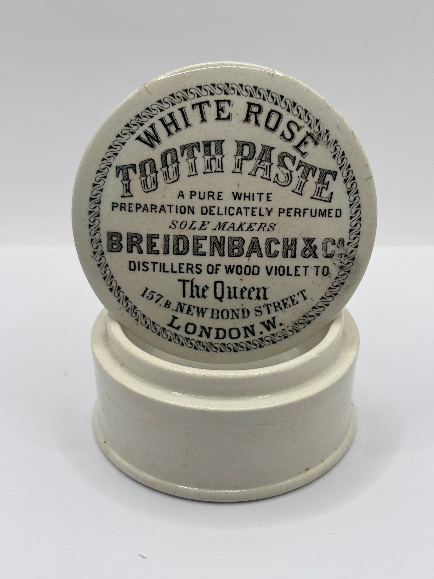 Old advertising lid and base, White Rose Tooth Paste