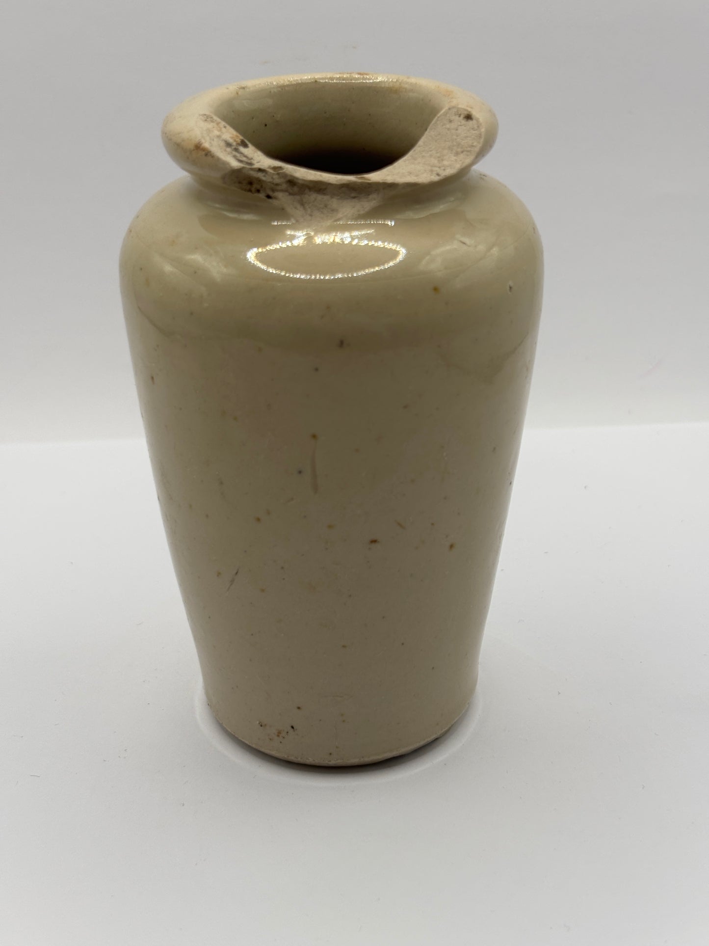 Old advertising cream pot, Galloway creamery Stranraer. Damaged