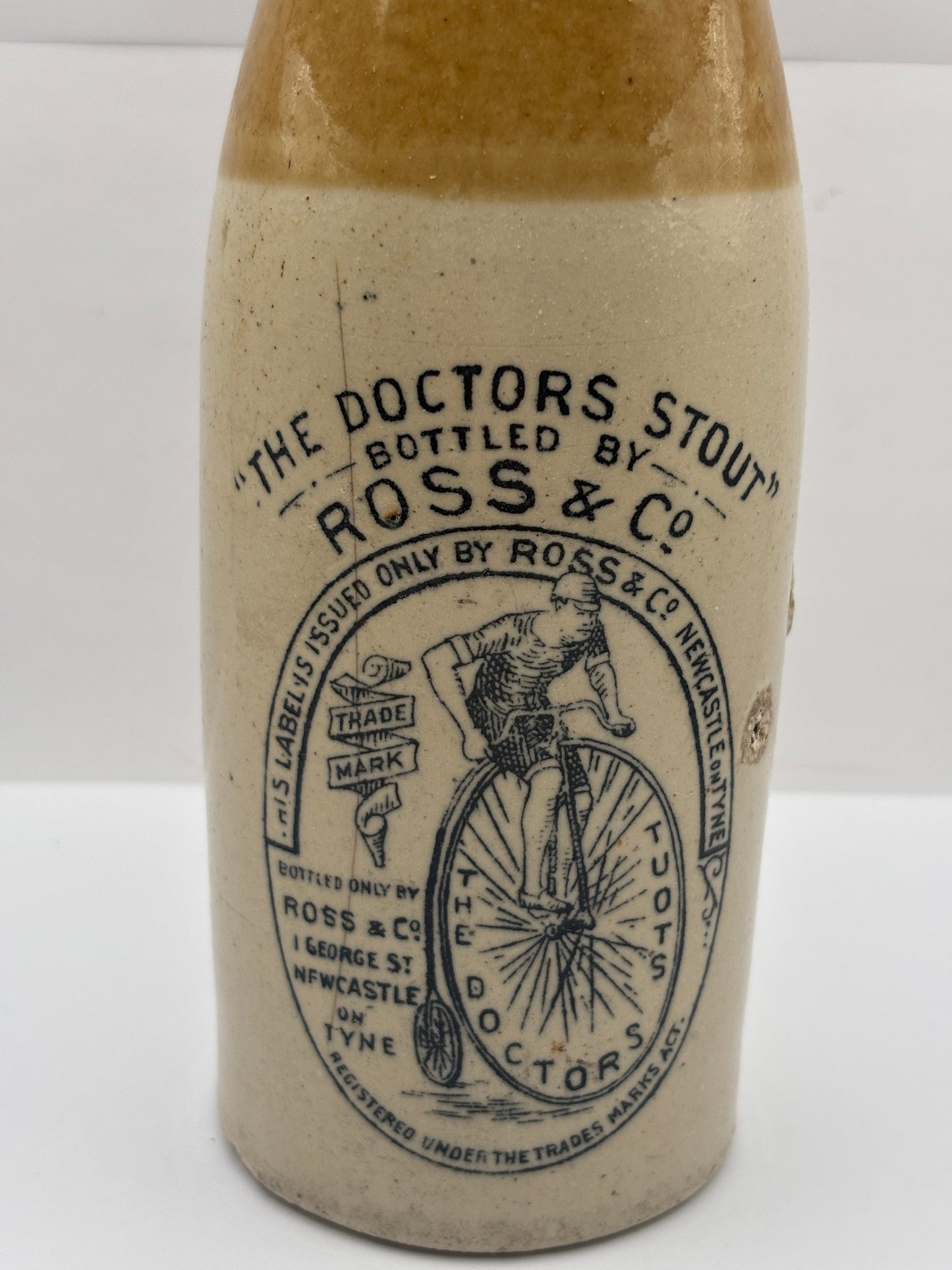 Old stoneware stout bottle, The Doctors stout, Ross & Co. Hairline