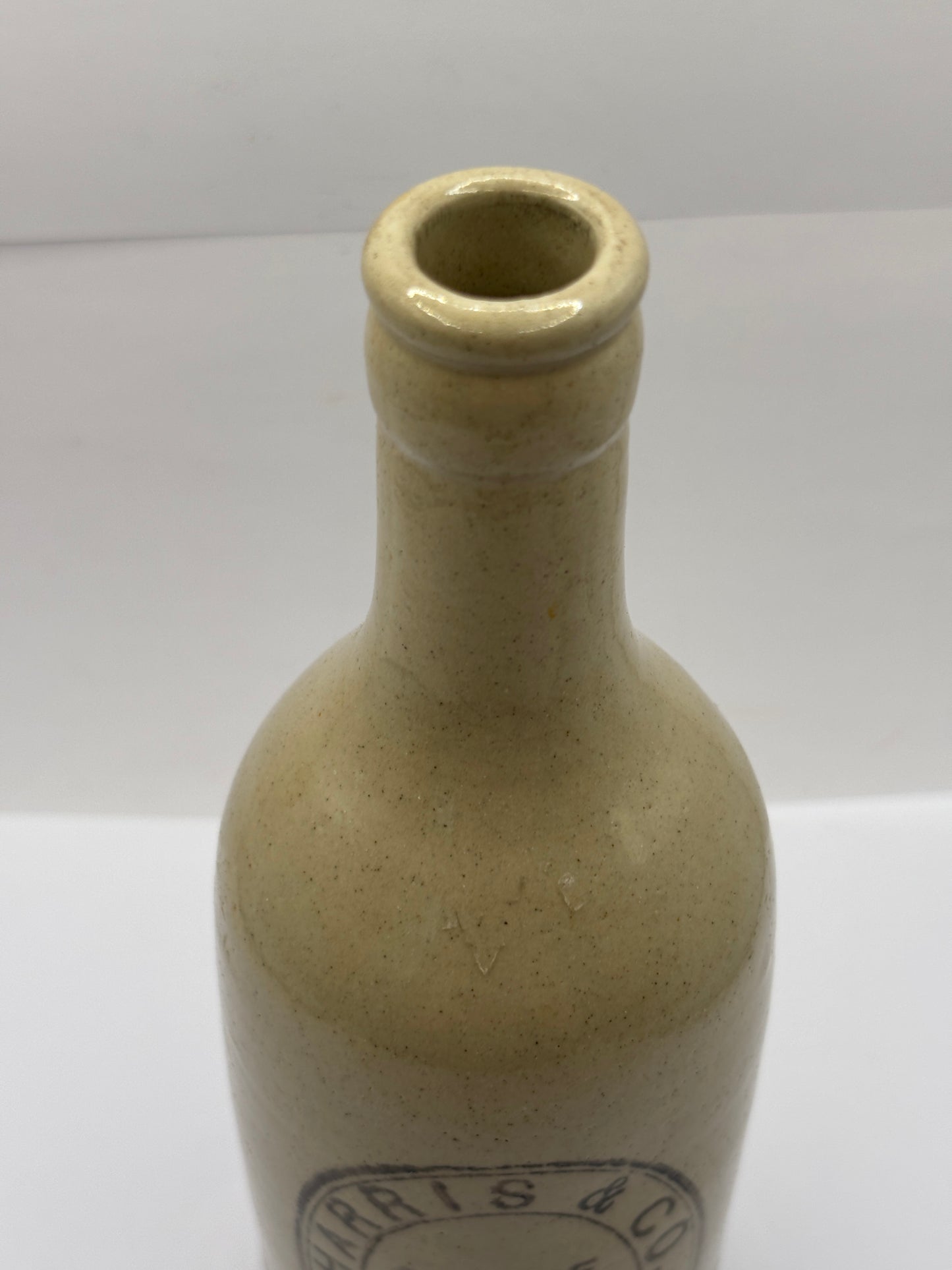 Old white stoneware ginger beer bottle, Harris & Co