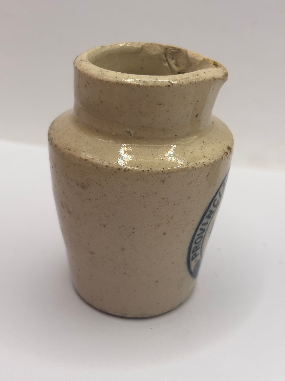Old advertising cream pot, Provinical dairies Leeds. Chipped