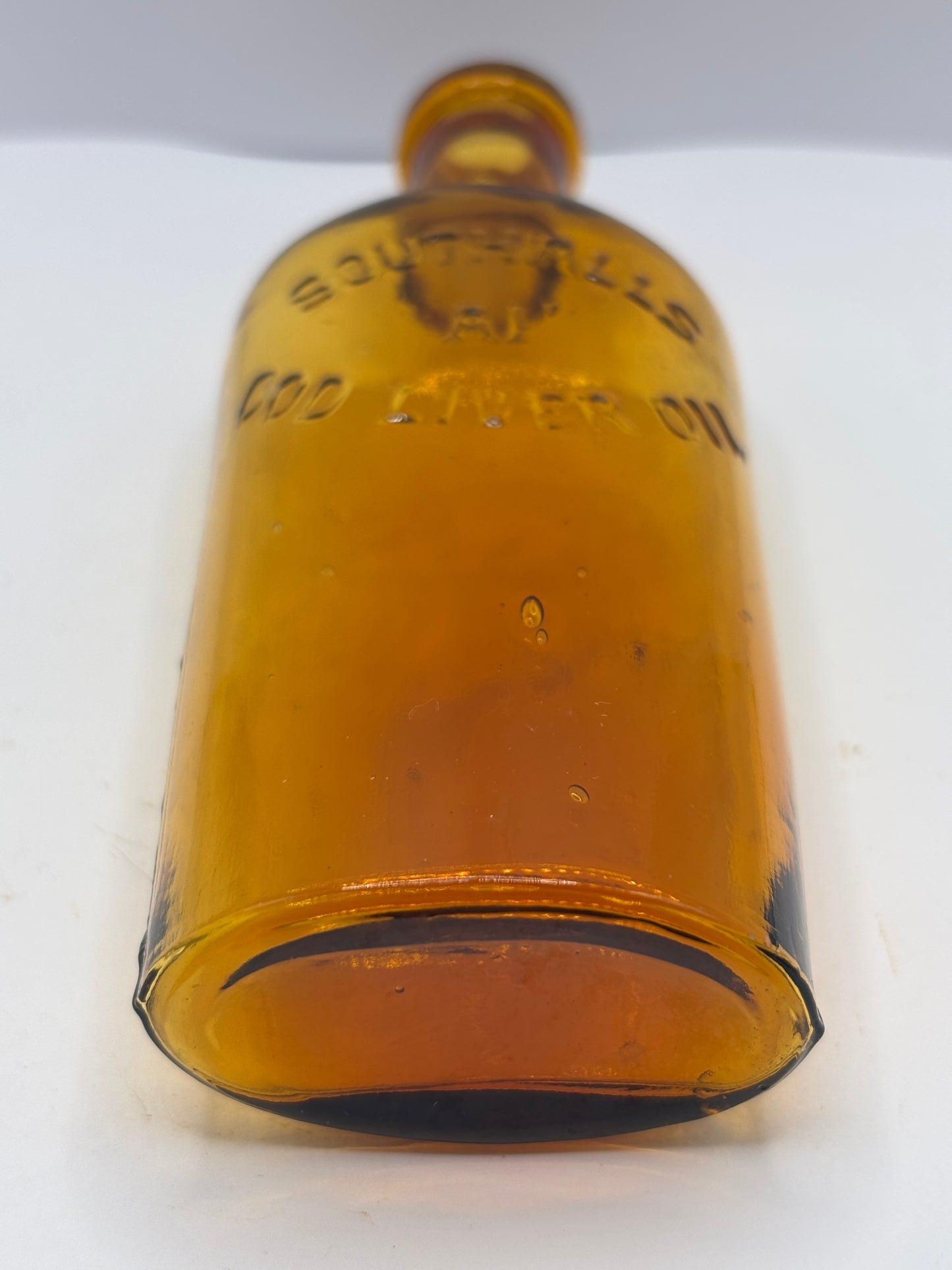 Old amber cod liver oil bottle