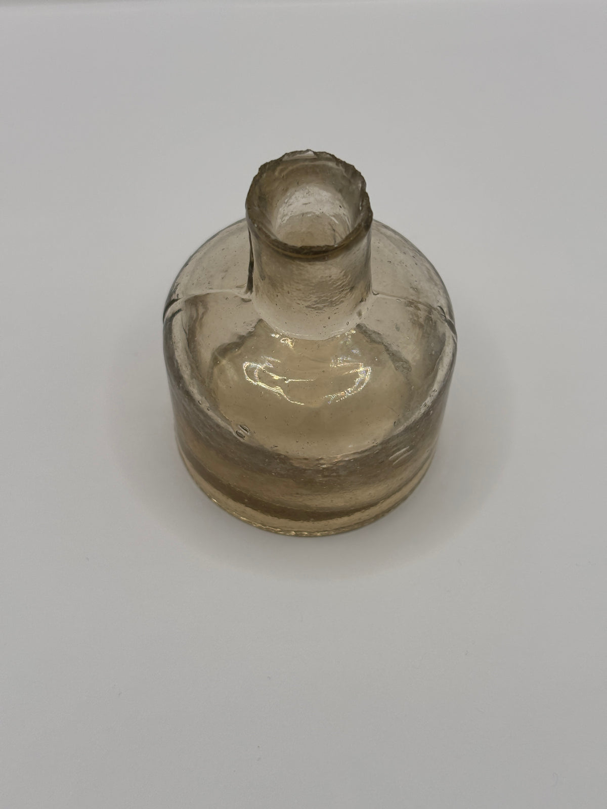 Old glass ink, inkwell, peachy coloured