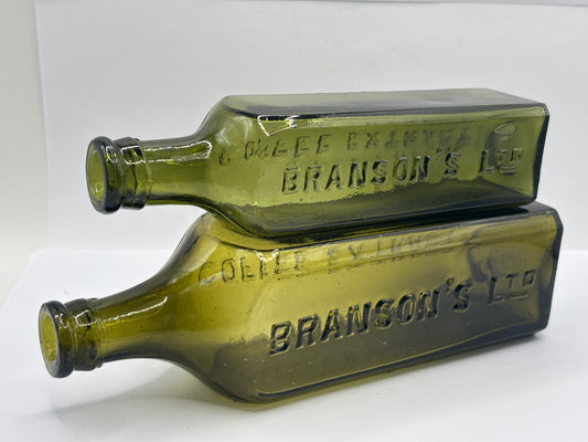 2 Old green glass Branston sauce bottles