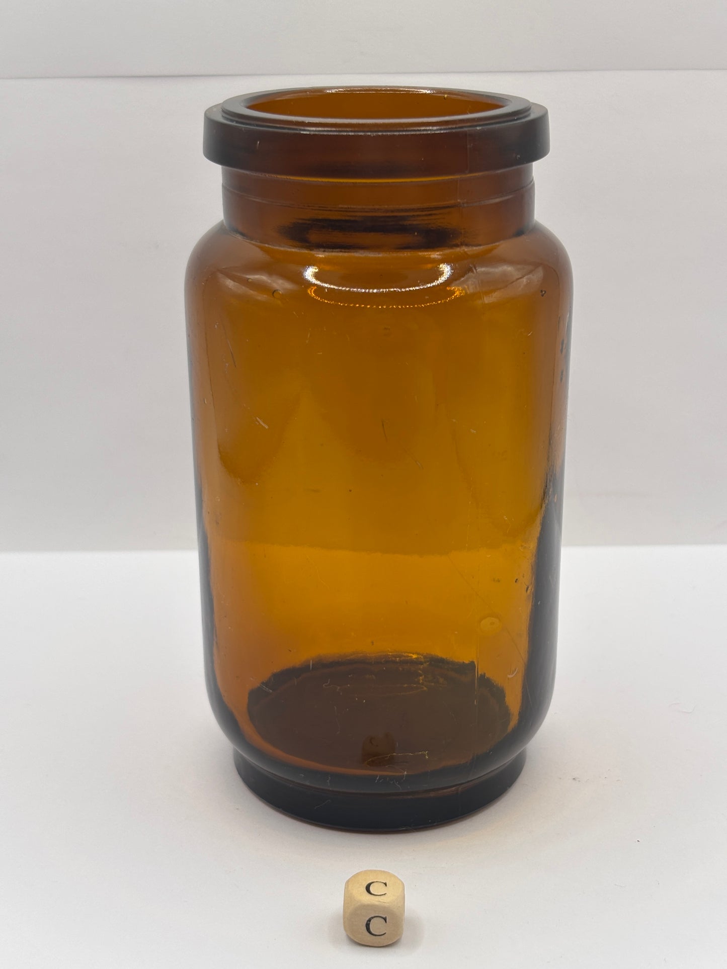 Old amber glass jar (c)