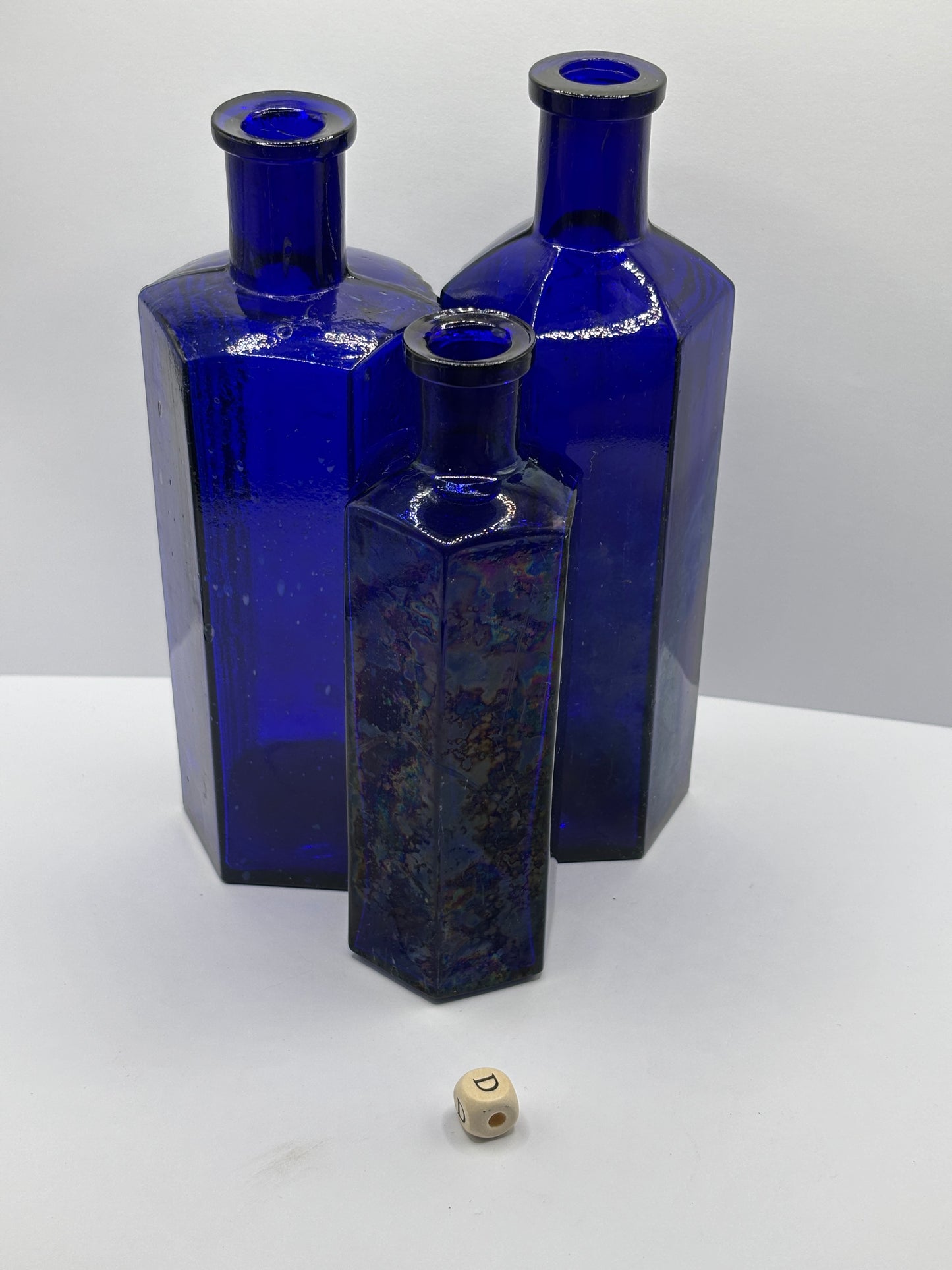 3 old blue poison bottles, not to be taken