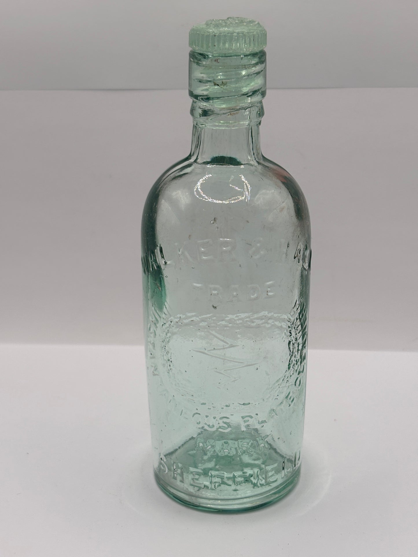 Old aqua glass advertising bottle, Instantaneous plate cleaner, Sheffield