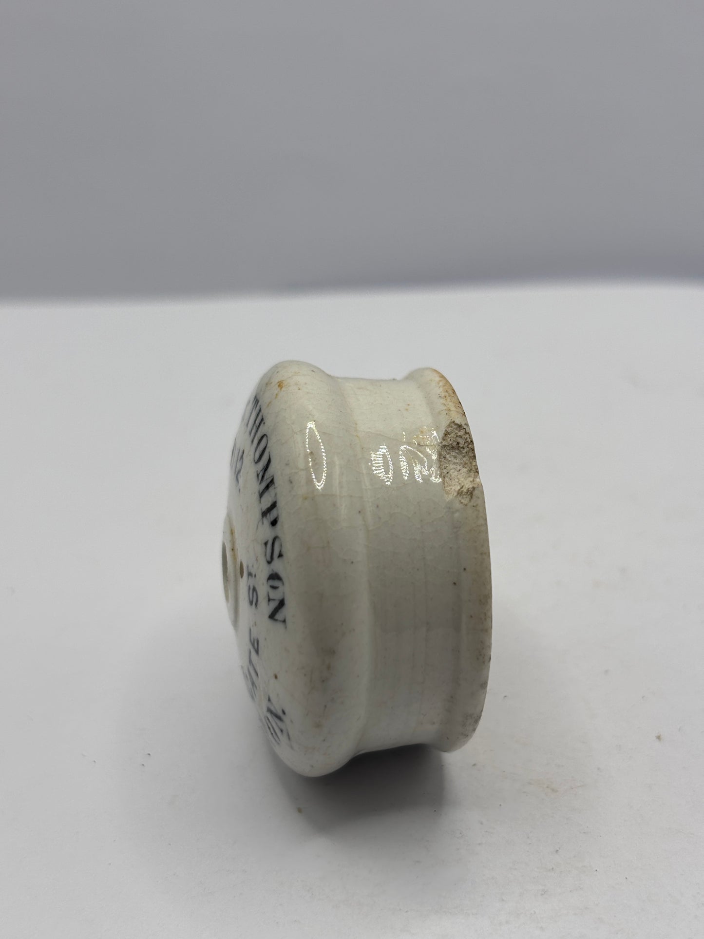 Old advertising baby feeder lid