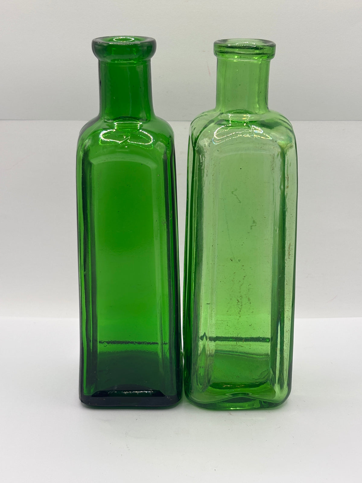 2 old green glass IZAL bottles 18.5cms