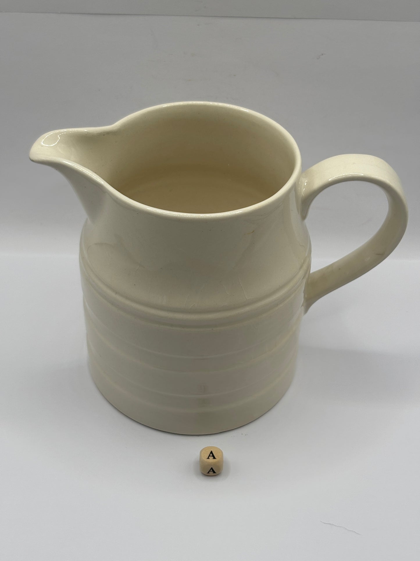 White vintage stoneware jug (a)