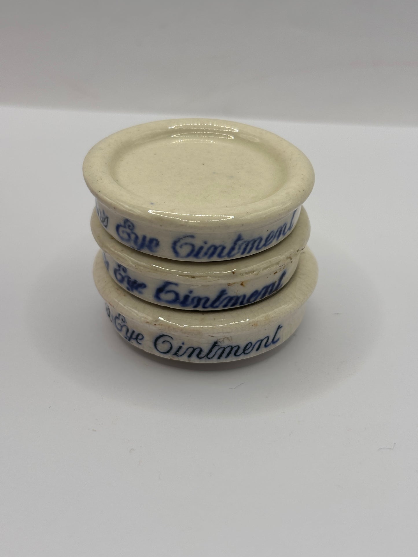 3 Old Singletons stoneware eye ointment, stack