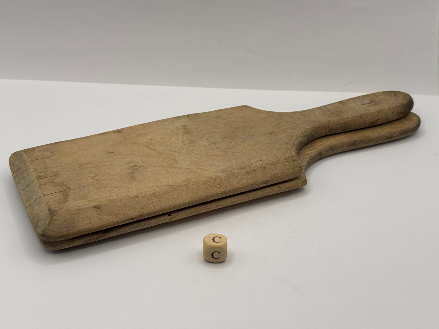 Old wooden butter pats (c)