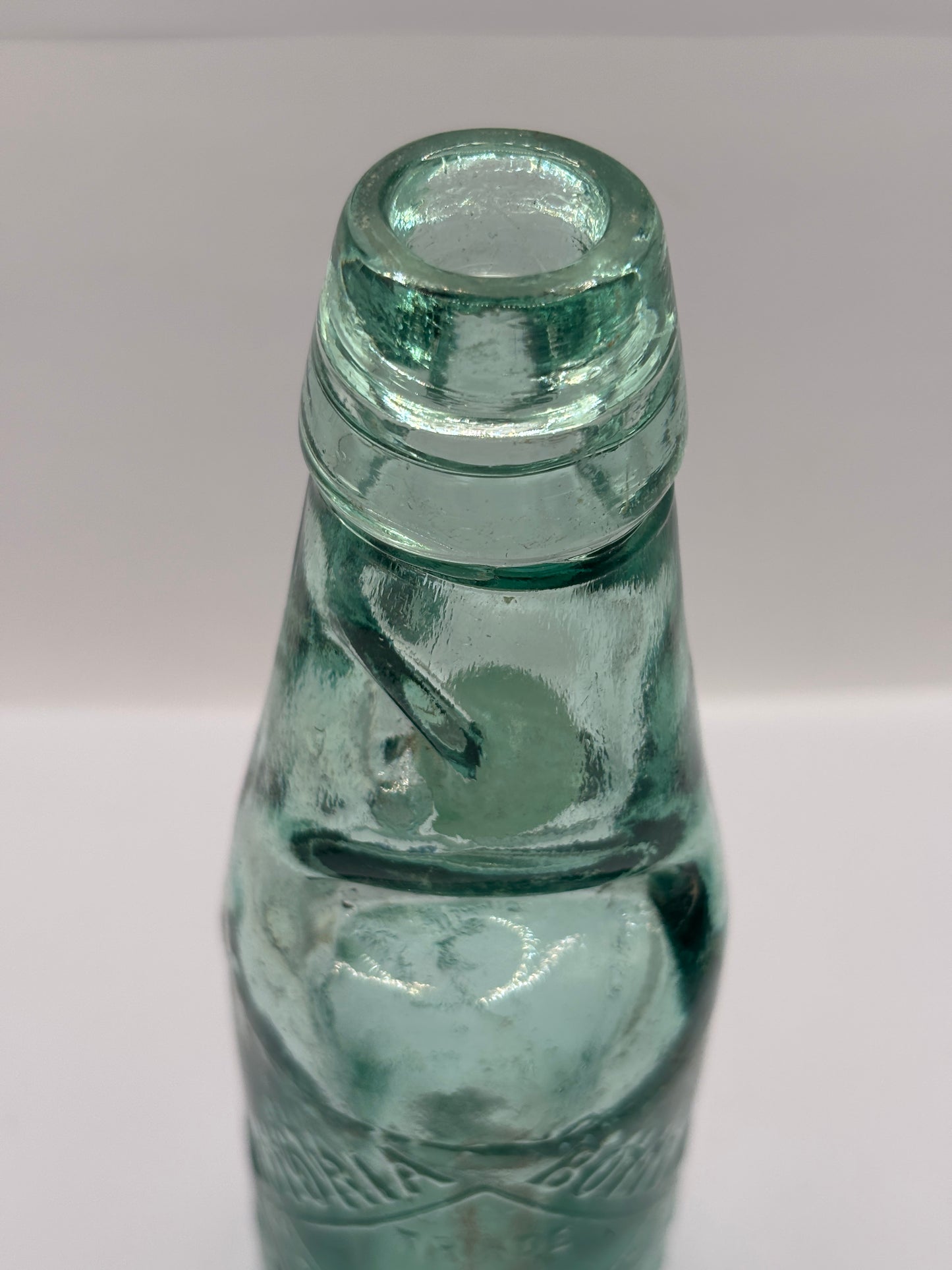 Old Bolton codd bottle, with marble. Victoria bottling stores