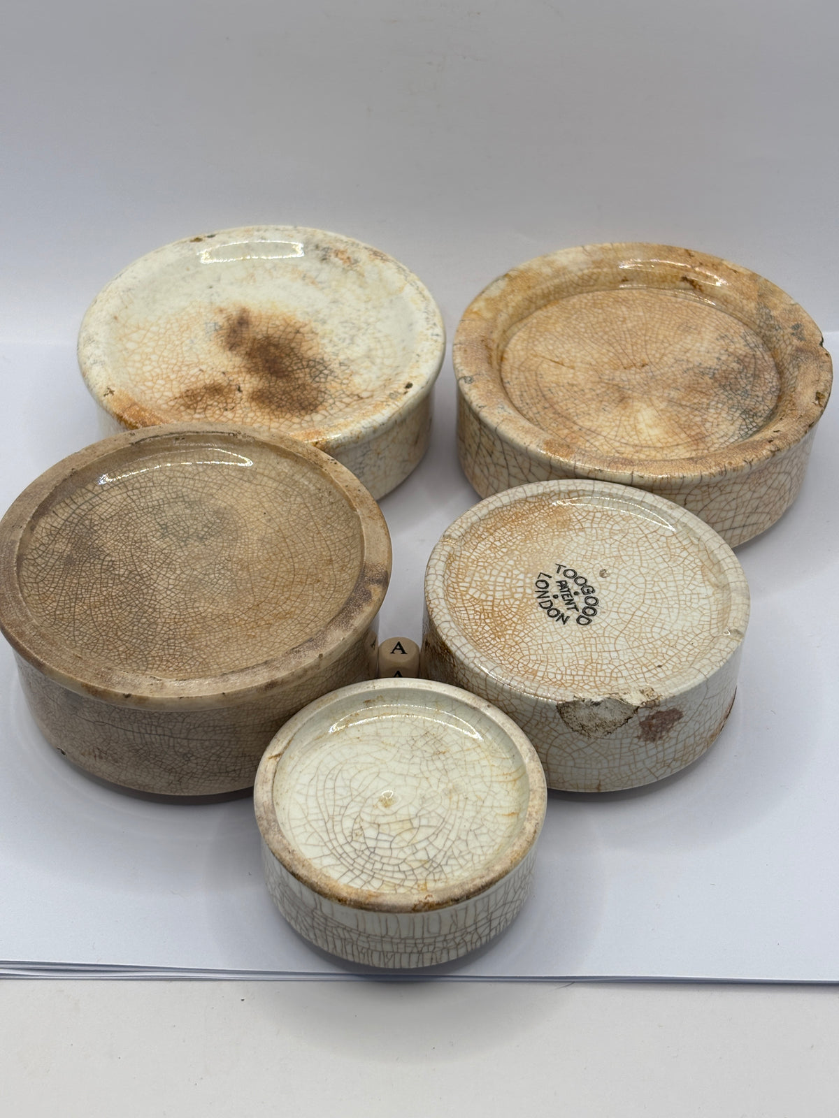 5 old stoneware pot lid bases, stackers (a)