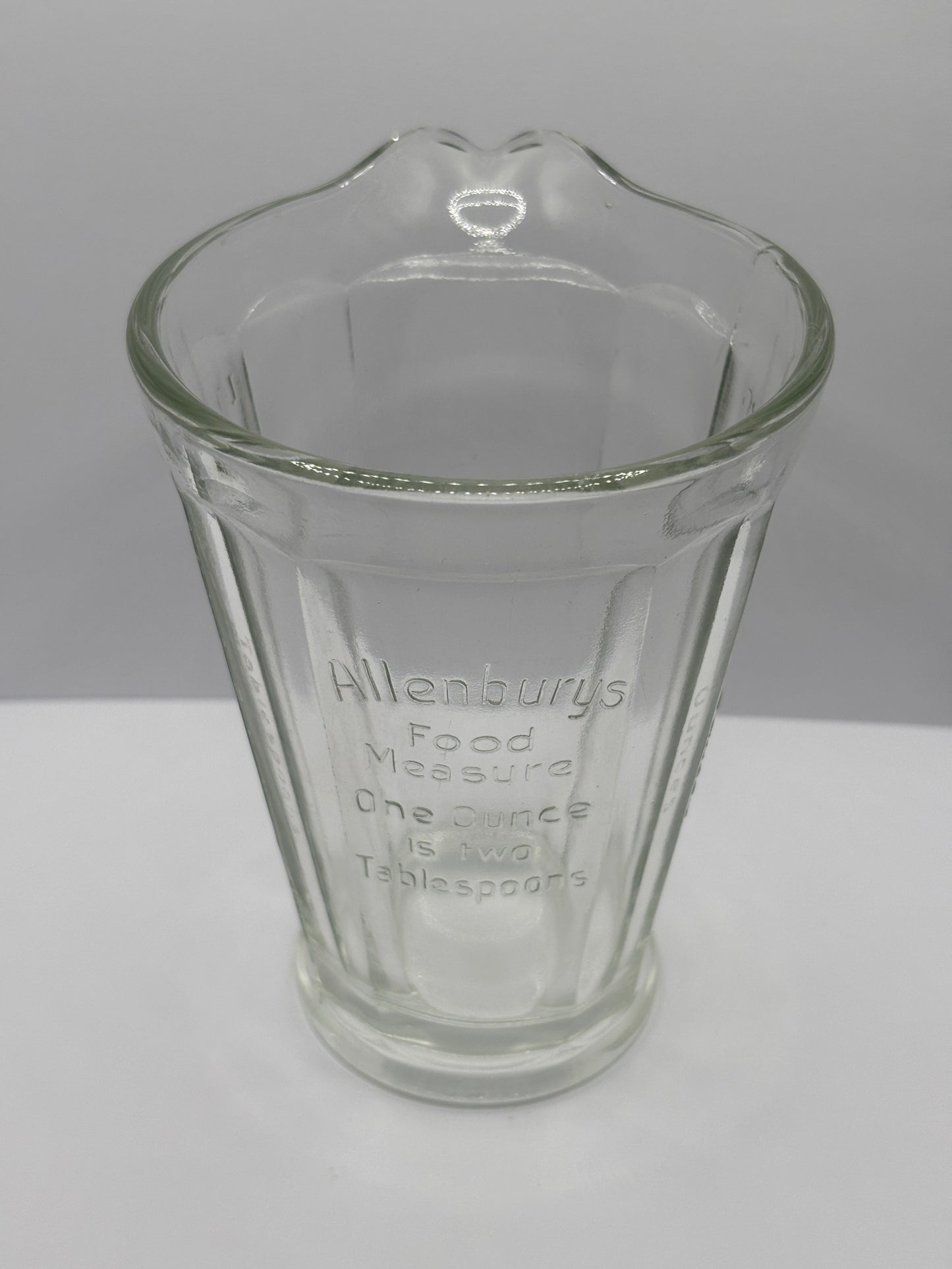 Old glass advertising food jug, Allenbys food measure