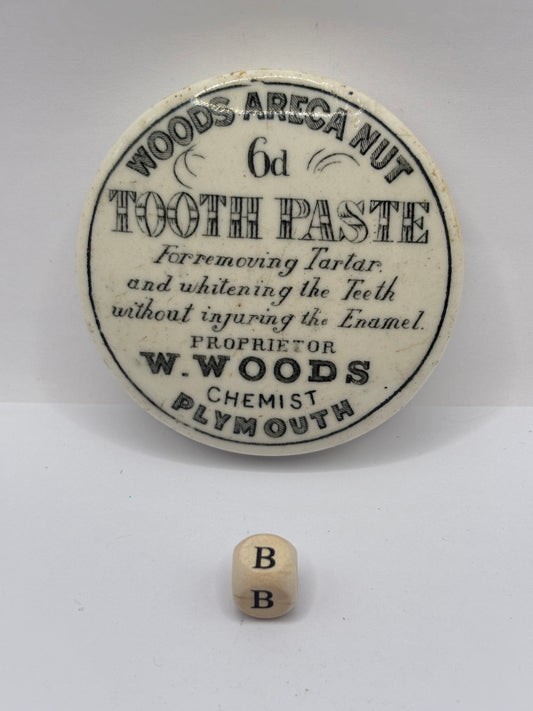 old advertising lid, Woods areca nut toothpaste (B)