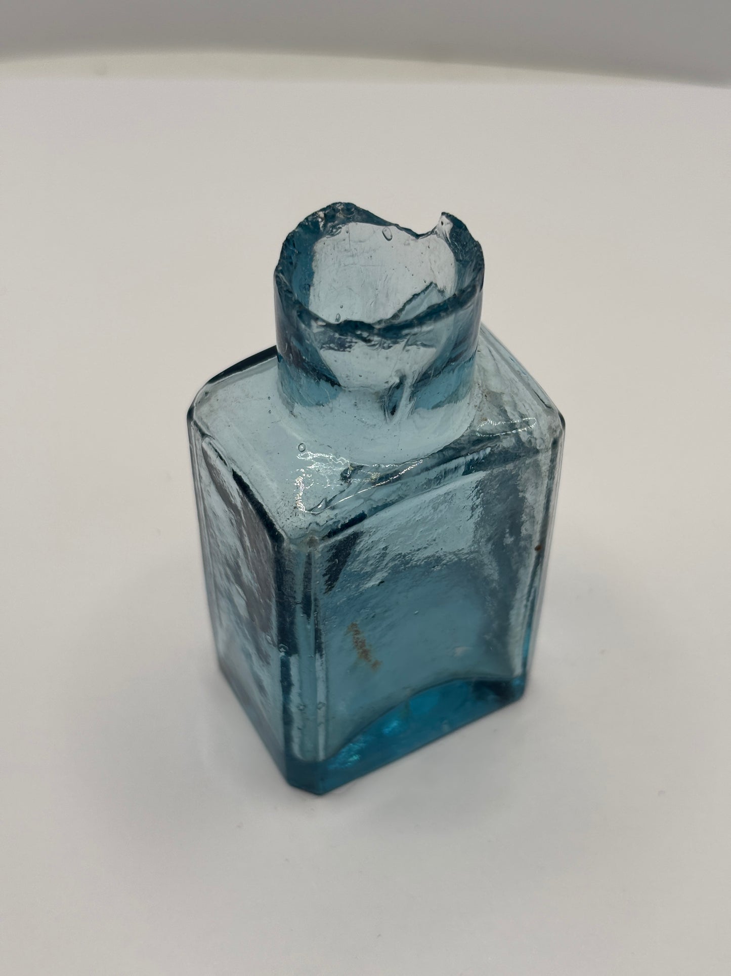 Old ice blue glass advertising ink & gum bottle, inkwell.