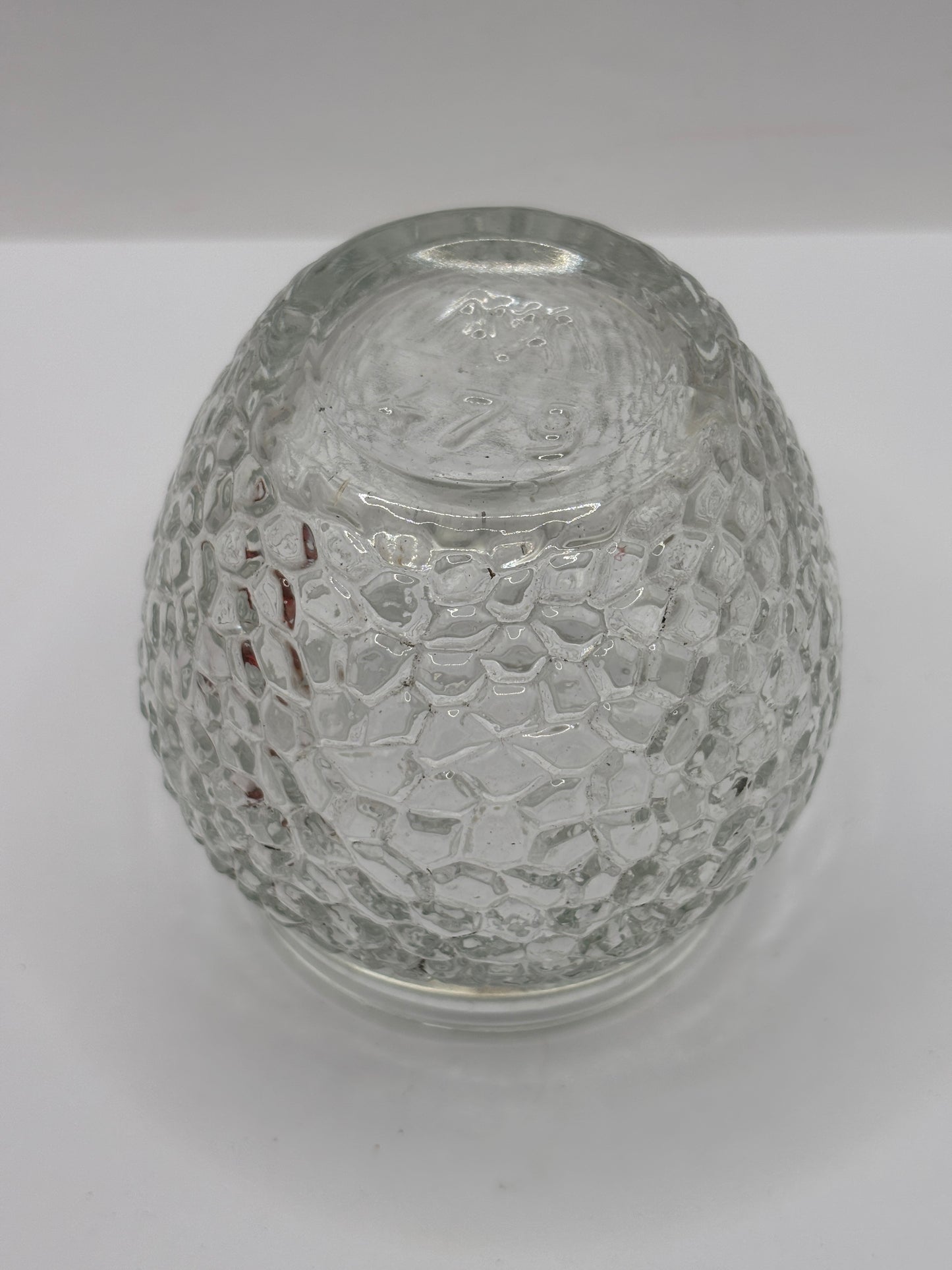 Old clear glass honey jar