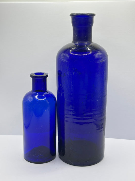 2 old large blue poison/chemist bottles