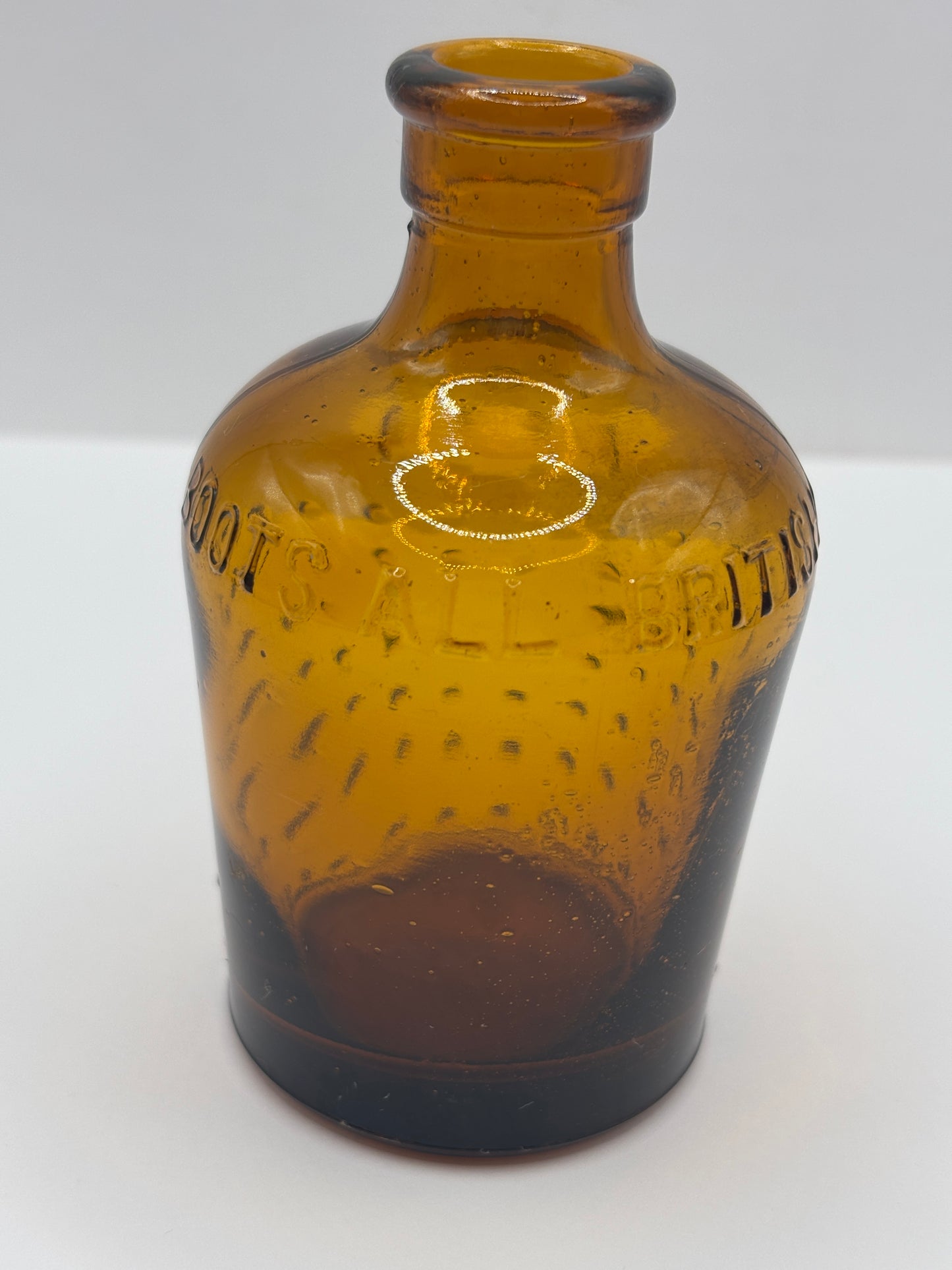 old amber glass Lysol bottle, Boots all british