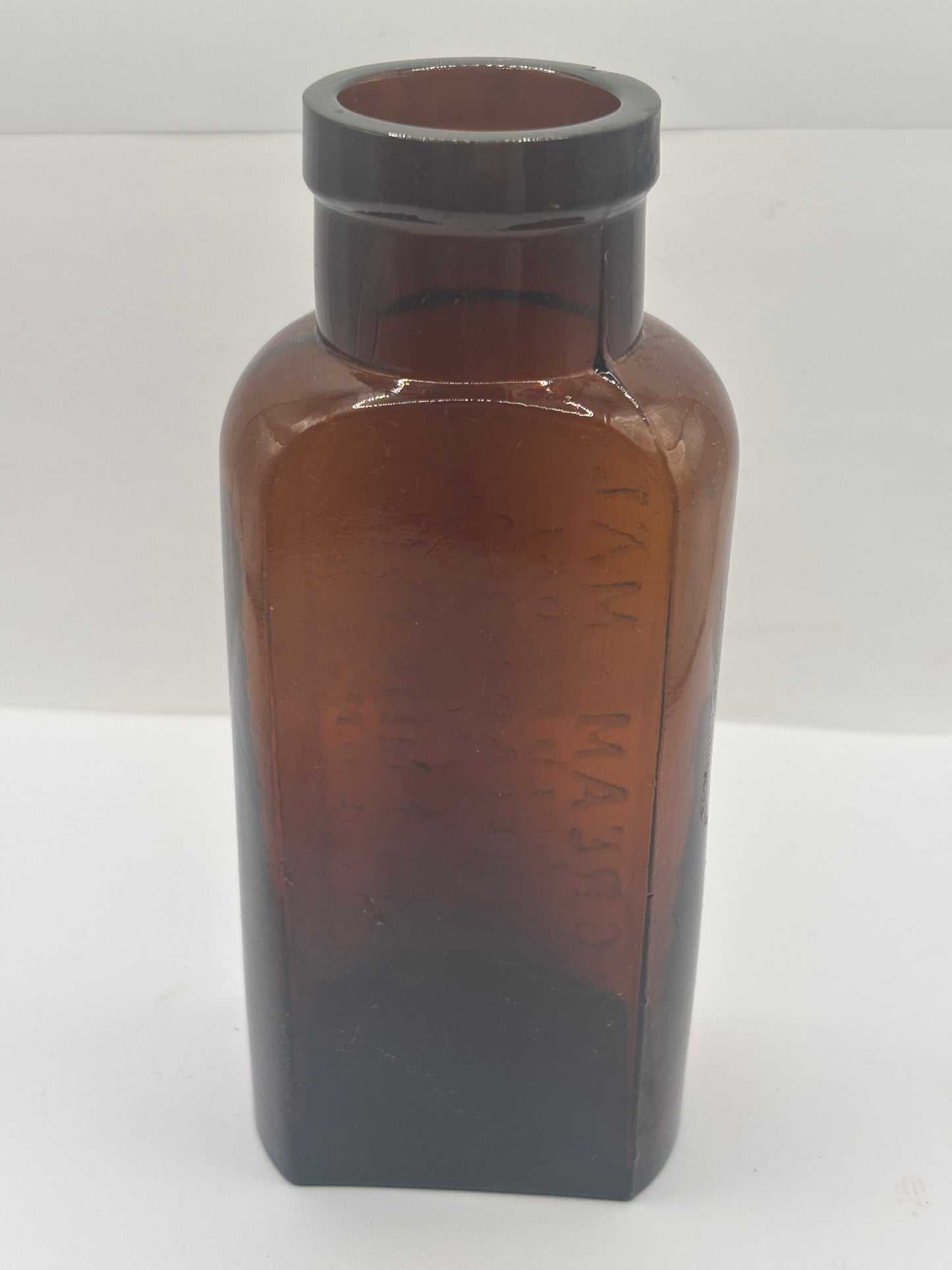 Old amber glass cream of malt bottle