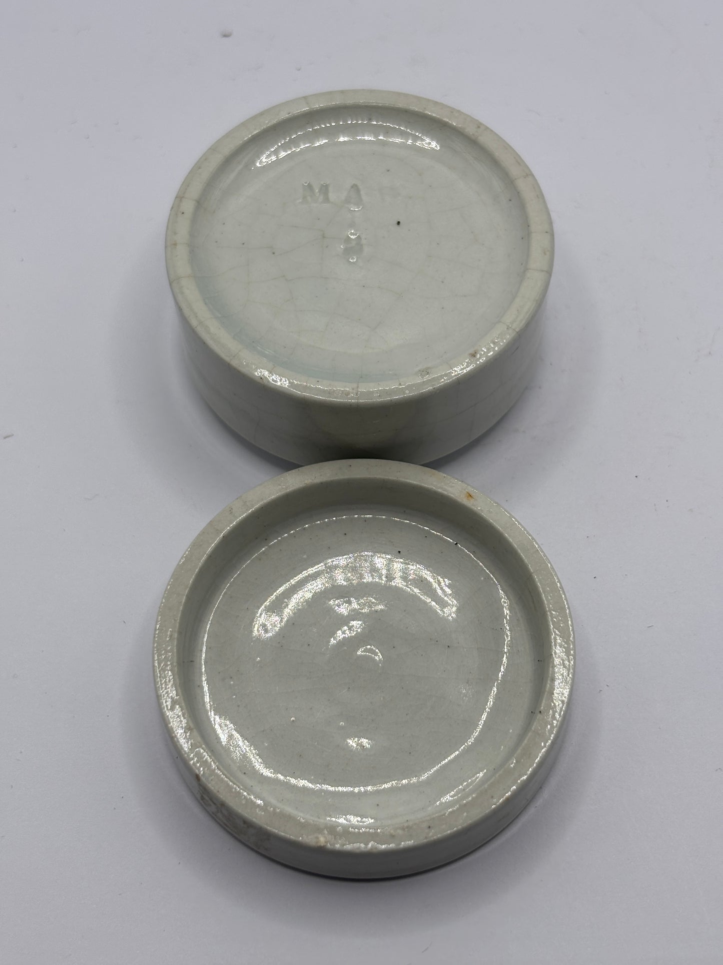 Old small pot lid and base. Crazed