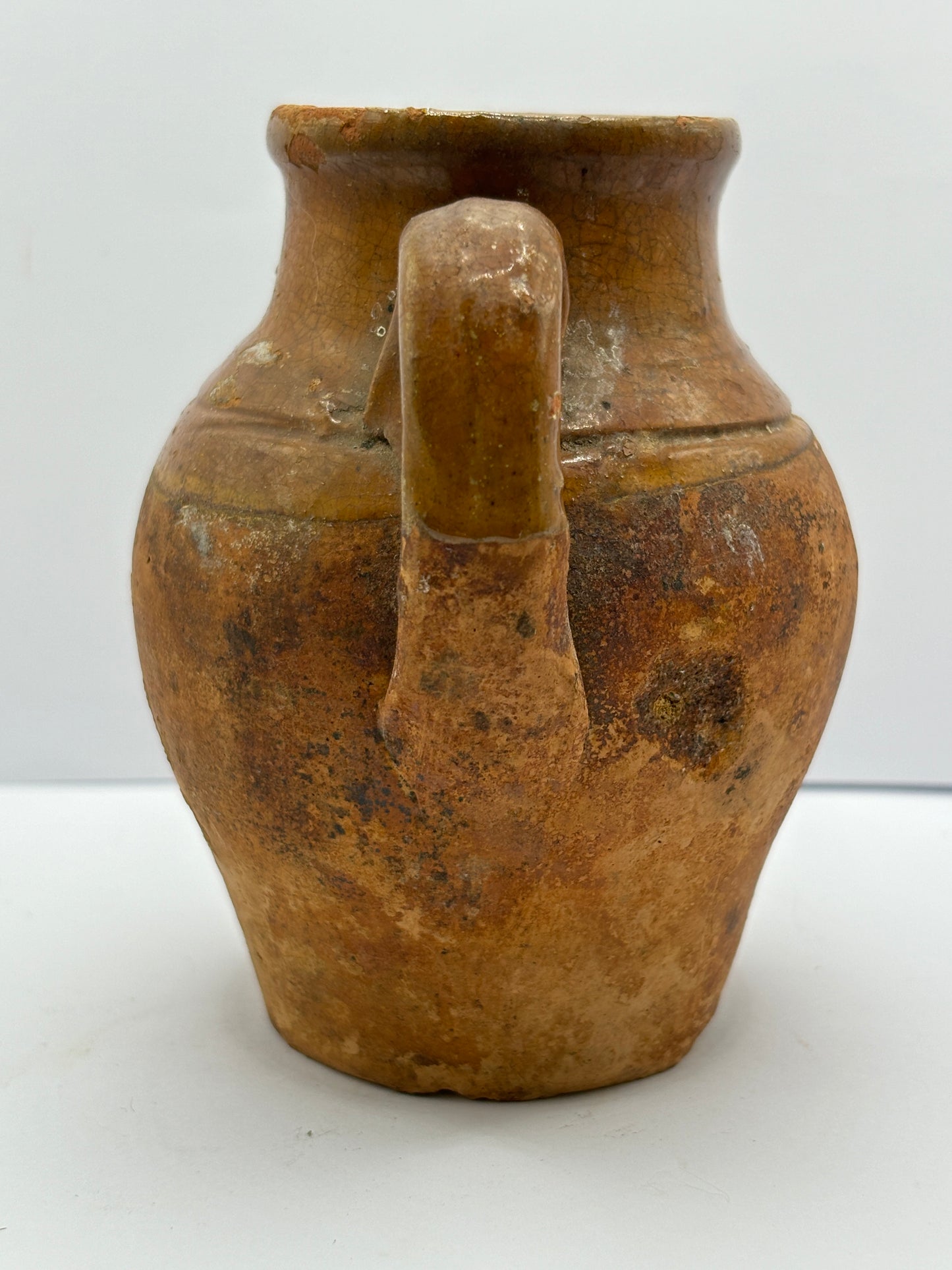 Old small double handled stoneware jug