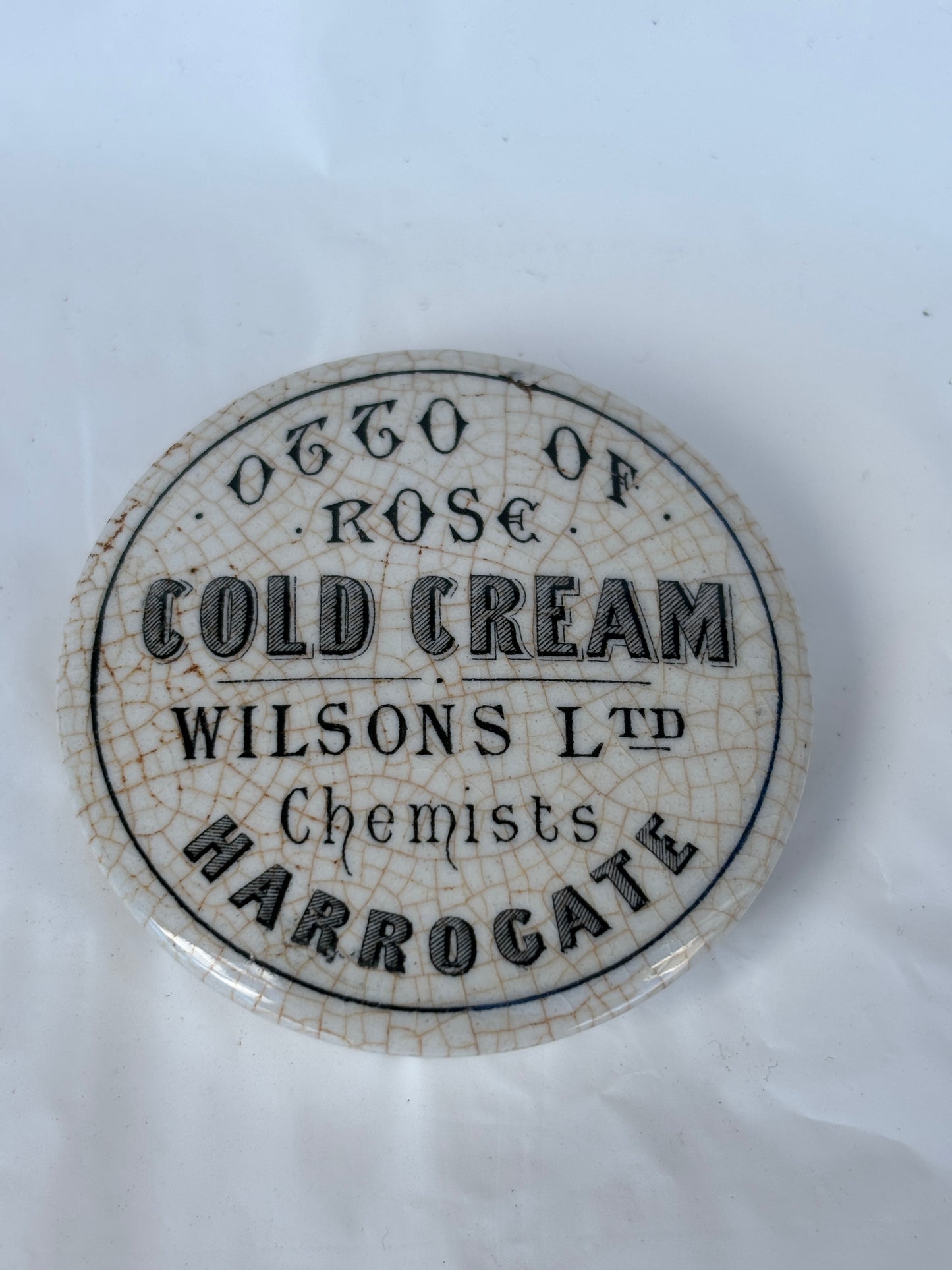 Old otto of rose cold cream advertising lid, pot lid. Harrogate