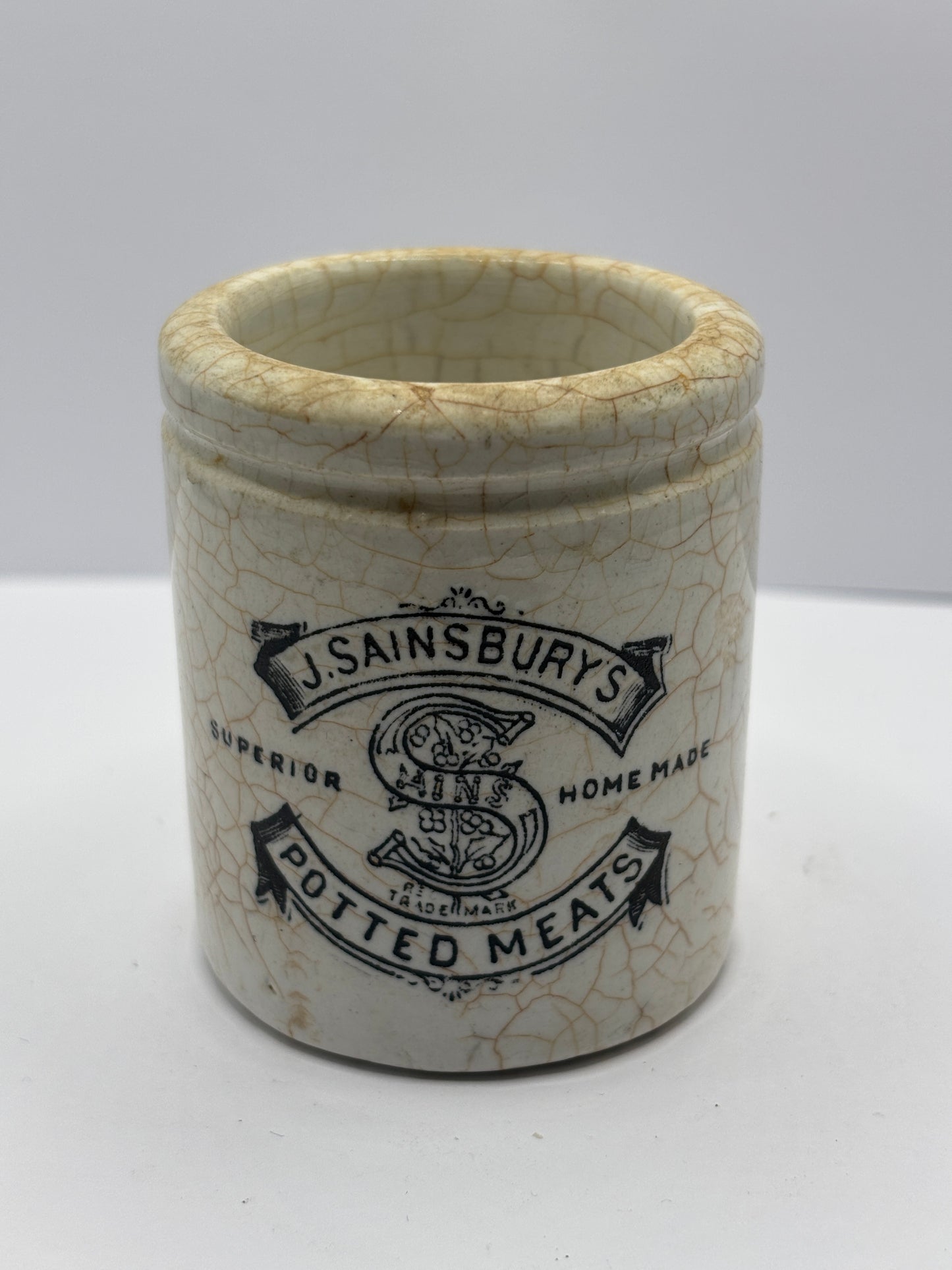 Old stained & crazed sainsburys advertising pot