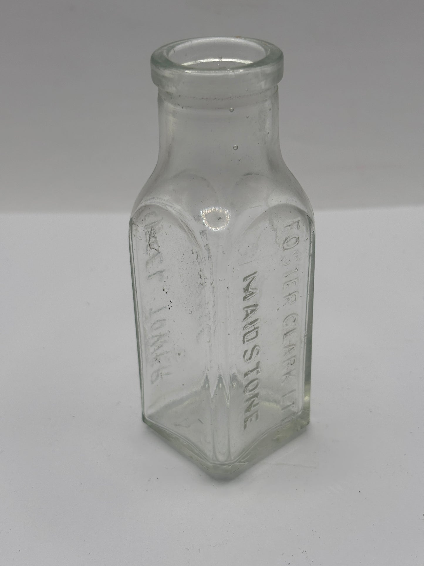 Old clear glass Eiffel tower lemonade bottle