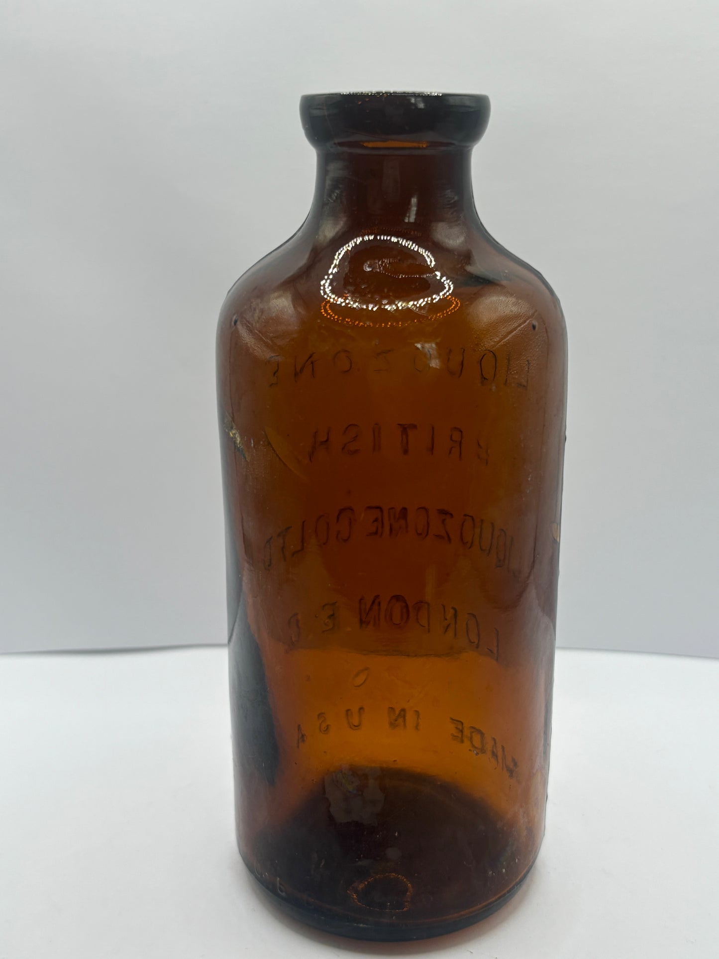 old amber glass liquozone bottle