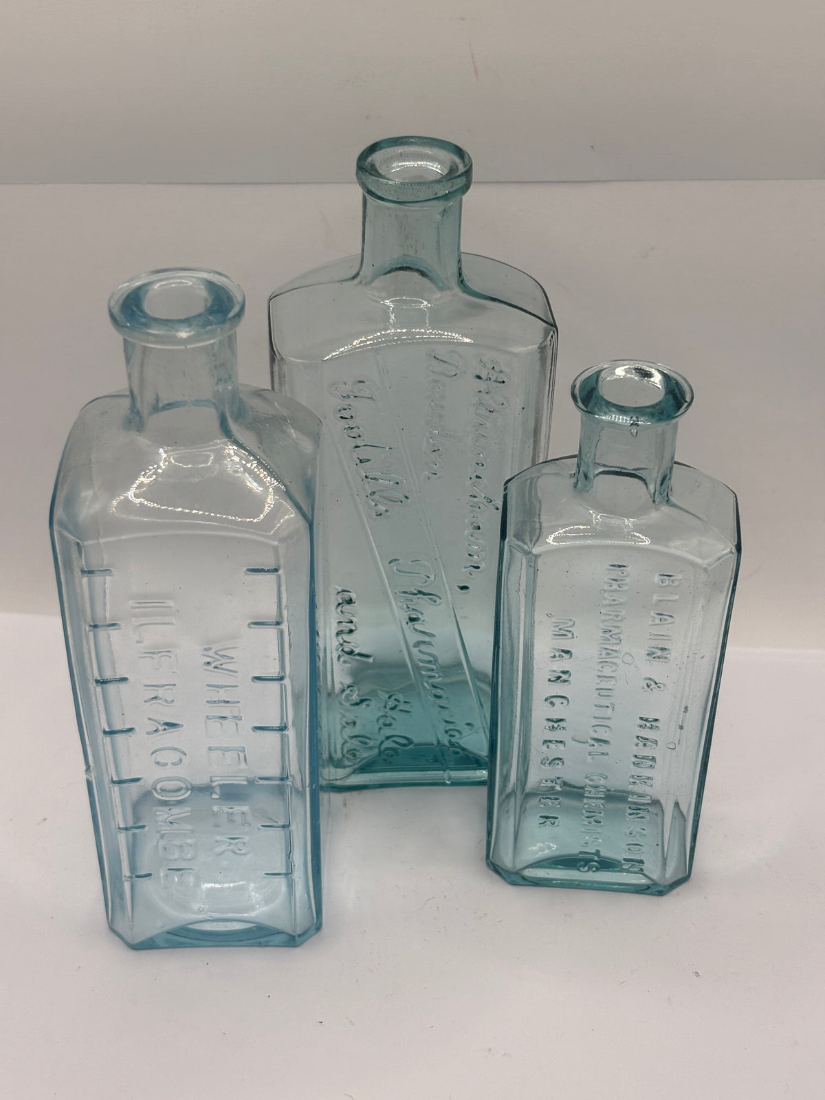 3 old aqua glass advertisement chemist bottles